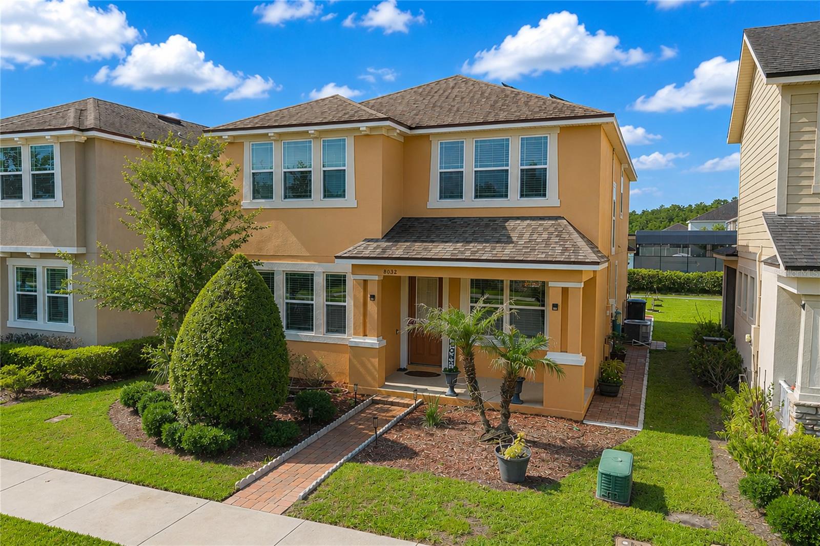Location! Location! Welcome to this beautifully maintained home located in the desirable community of Randal Park in the Lake Nona area, where comfort, efficiency, and tranquility come together. Nestled on a lot with a conservation view, this property offers peaceful views and exceptional privacy, creating the perfect setting to relax and unwind on the front porch.

Step inside to discover an open floor plan.  The kitchen features an island with upgraded cabinets and stone countertops.  The home is equipped with energy-saving solar panels, helping to significantly reduce monthly electricity costs while providing long-term value. A whole-house water filtration system delivers clean, high-quality water throughout the home for added comfort and convenience.

Enjoy Florida living year-round from the screened-in covered porch—an ideal space for morning coffee, entertaining guests, or outdoor cooking.  Additional features include an expanded driveway, electric vehicle charging outlets, making this home future-ready for EV owners.

Conveniently located near schools, shopping, dining, medical facilities, major highways, and all that Lake Nona has to offer, this exceptional property combines modern amenities with peaceful surroundings. Don't miss this opportunity to own a move-in-ready home in one of Central Florida's most desirable communities.