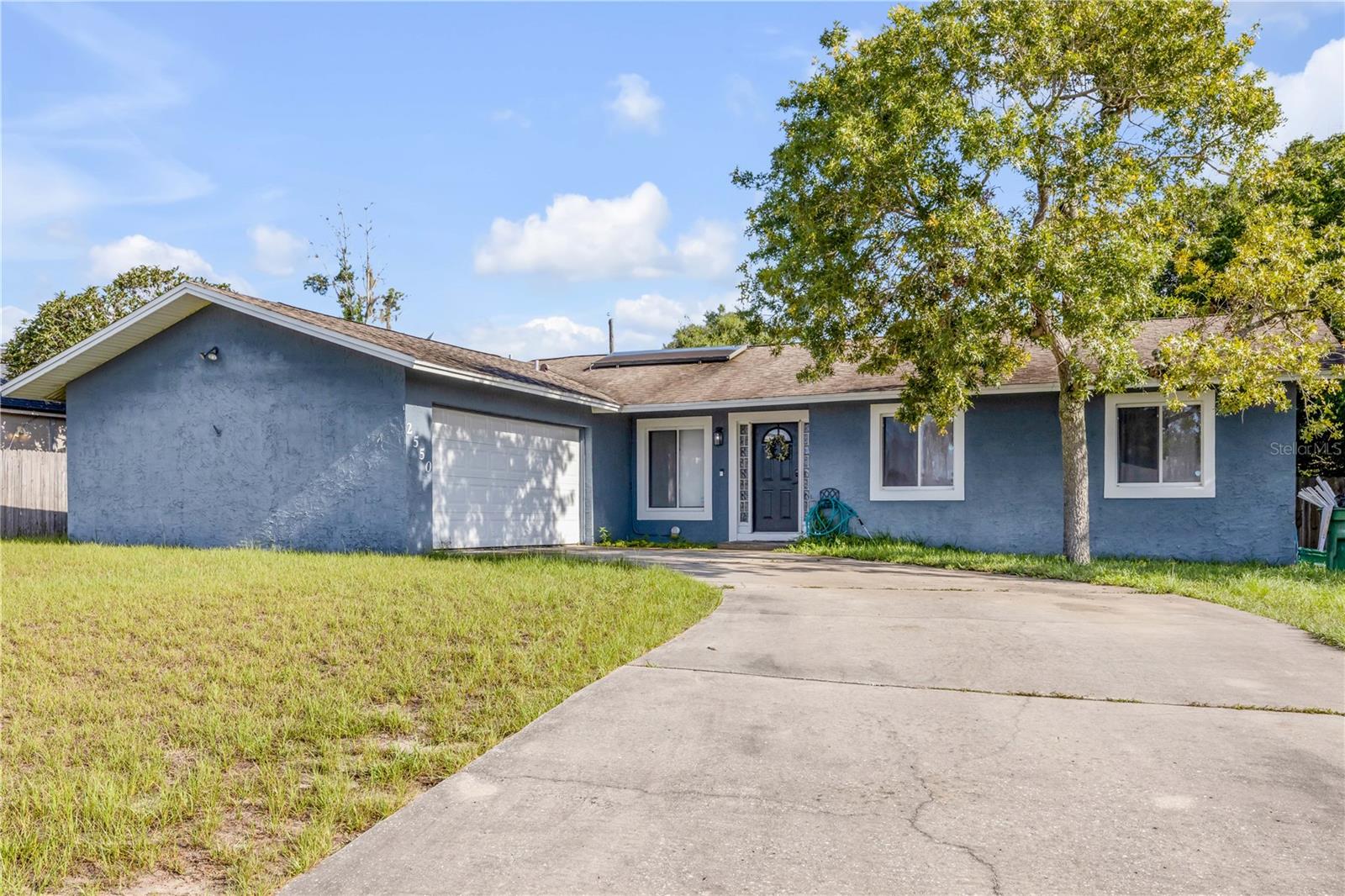 Welcome home to this beautifully updated 3-bedroom, 2-bath concrete block residence offering 1,288 square feet of comfortable living space. Renovated in 2019, this move-in-ready home features a stylish kitchen with granite countertops, updated cabinetry, modern fixtures, and updated flooring throughout. The functional split-bedroom floor plan provides both comfort and privacy, while the spacious living and dining areas are ideal for everyday living and entertaining. Situated on an oversized lot with a fenced backyard and a two-car garage, this property offers plenty of room for outdoor enjoyment. Conveniently located near shopping, dining, schools, parks, and major roadways, this home is perfect for first-time buyers, downsizers, or investors seeking a turnkey opportunity. No HOA!