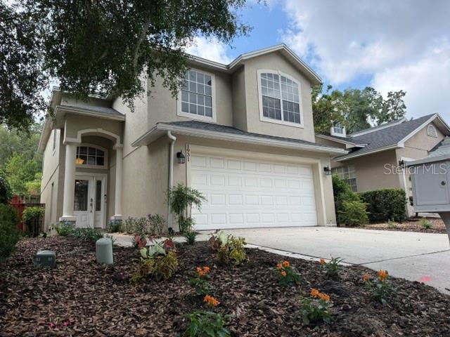 The Springs, a Gated Community with Manned Security and Patrol, Walk to the Residents Only Park with a Spring Fed Lake, Community Pool, Clubhouse, Gazebo, Tennis Courts, Basketball Court and Playground.  Beautiful Oak Trees are all over the Neighborhood, Truly a Special Place to Live.  Engineered Hardwood Flooring throughout the downstairs, Kitchen has Shaker Cabinetry, Stainless Steel Appliances, The Floor Plan is Open Concept with the Great Room, Kitchen and Dining Room all Open. Great Room has a 20' Ceiling with a Balcony open from the upstairs.  The Primary Suite is Spacious with a Whirlpool Tub, Separate Shower and Walk in Closet.  Bed Room 2 and 3 have Large Windows and Generous Closets.  The Inside Downstairs Laundry Room has built in Cabinets and Storage.  Roof was installed 6/2021.  Close Proximity to I-4, Shopping, Sanford, New Smyrna Beach, Disney, Seaworld and Advent Health Hospital and Orlando Health Lake Mary Hospital.  A beautiful Home ready for a new family.