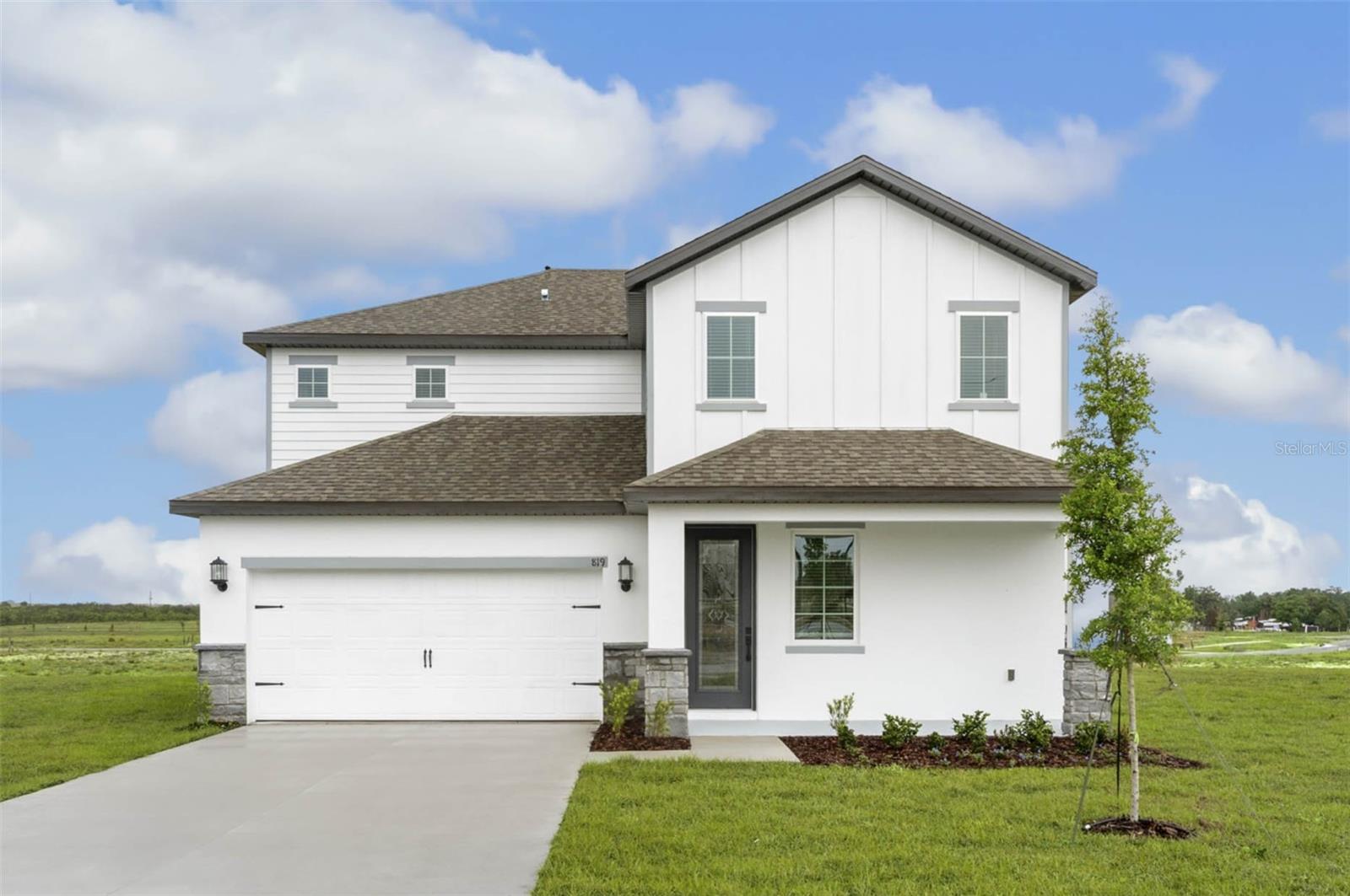 Welcome to the Ruby at Citrus Place in Babson Park, a beautifully designed five-bedroom, three-bathroom home offering space, comfort, and modern style. This open-concept layout is perfect for both everyday living and entertaining, featuring an expansive family room that flows seamlessly into a chef-inspired kitchen.

The kitchen is thoughtfully designed with quartz countertops, stainless steel appliances, a subway tile backsplash, and a large island with a breakfast bar—ideal for cooking, gathering, and creating lasting memories. A dedicated dining area provides the perfect setting for family meals and special occasions.

Upstairs, the private master suite offers a relaxing retreat with a generous walk-in closet and a luxurious bathroom featuring a dual-sink vanity and additional linen storage. Each additional bedroom is well-sized, offering comfort and privacy, making them perfect for guests, a home office, playroom, or fitness space.

Step outside to enjoy the covered patio and professionally landscaped front yard, enhancing the home’s curb appeal. Additional highlights include smart home technology, energy-efficient windows, and durable luxury vinyl flooring throughout.

Located in the welcoming community of Citrus Place, residents enjoy amenities such as a children’s playground and scenic walking trails. With nearby lakes and parks just minutes away, you’ll have easy access to outdoor activities like boating, fishing, and kayaking, along with convenient shopping and dining options.

Don’t miss your opportunity to own this versatile and beautifully crafted home—schedule your showing today!