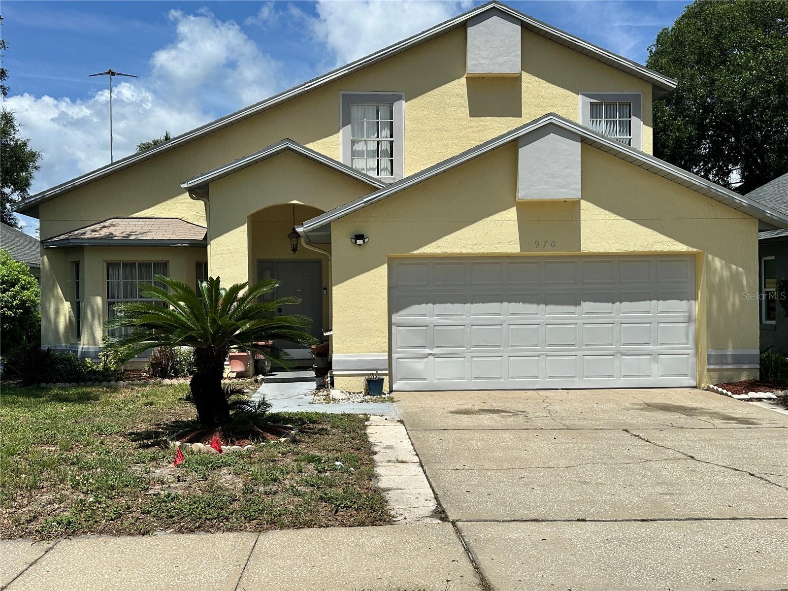 Welcome home to this beautiful single-family residence, perfectly situated on a quiet cul-de-sac in one of Apopka Florida’s most peaceful communities. Boasting over 2,150 square feet of thoughtful living space, this home features a spacious 4-bedroom, 2.5-bathroom layout designed for effortless everyday living and entertaining. Step inside to find bright, airy interiors highlighted by a cozy fireplace—the perfect focal point for family gatherings. The functional floor plan seamlessly connects the living areas to a well-appointed kitchen, offering plenty of room for the home chef. Retreat to the generous bedrooms, including a primary suite that serves as your own private oasis. Outside, enjoy your Florida evenings on a manageable 5,252 sq. ft. lot that minimizes weekend yard work while offering plenty of space for pets or small gatherings. With an incredibly low quarterly HOA fee and an attached garage, this property delivers the perfect blend of value, space, and convenience.