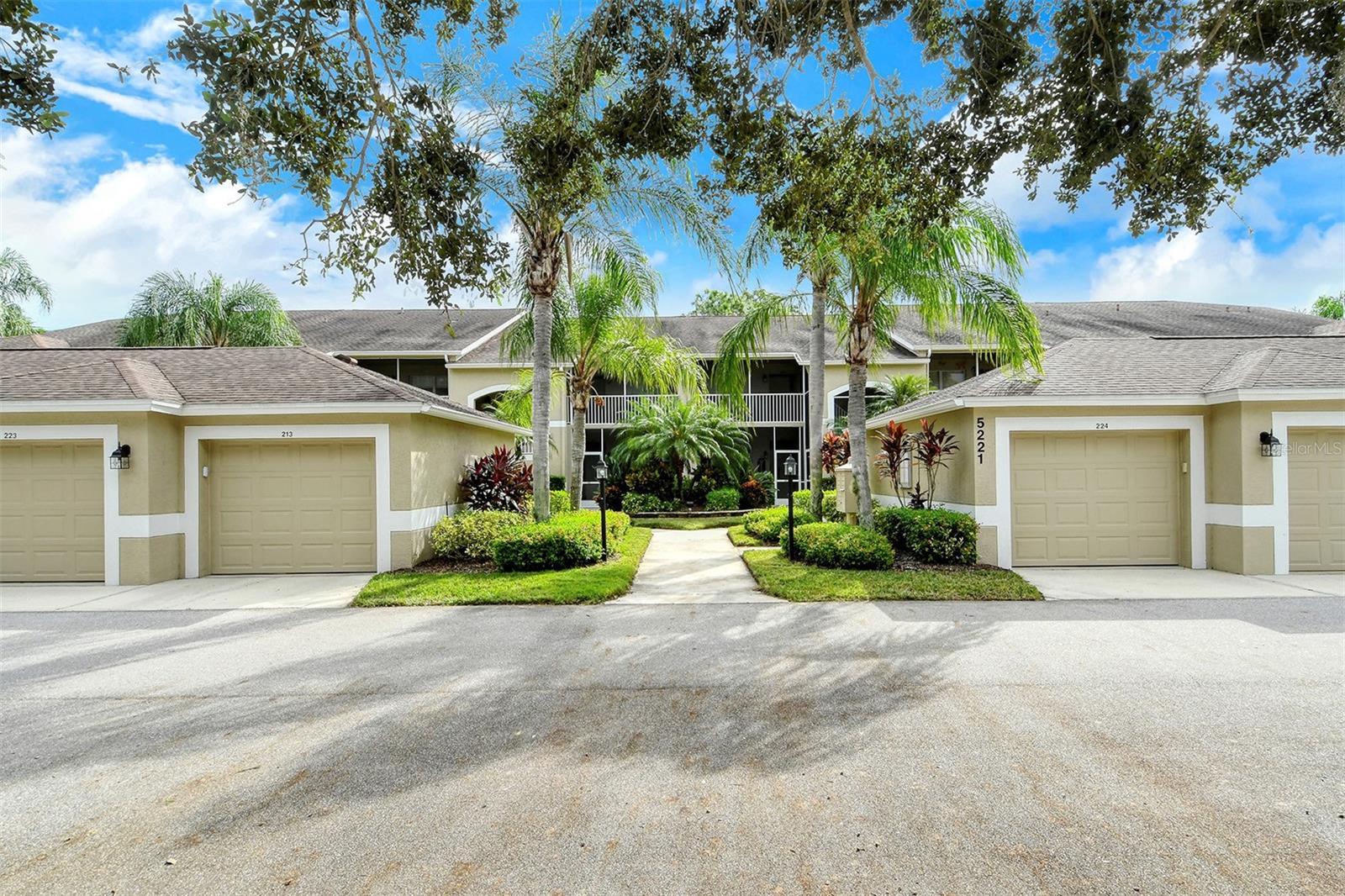 This is the property you have been waiting for! This Turn-Key Furnished and maintenance-free "Carlton" model Veranda in Heritage Oaks Golf & Country Club features 2 bedrooms, 2 full bathrooms, a one car garage and some absolutely outstanding easterly views of water, nature preserves and the 13th hole of the golf course. The property features a bright, open floor plan designed to maximize natural light and showcase the peaceful surroundings. The spacious living and dining areas flow seamlessly, creating an ideal space for both everyday living and entertaining. Large sliding glass doors lead to a private screened lanai complete with gorgeous tile flooring - perfect for morning coffee, evening cocktails, or simply soaking in the quiet beauty of Southwest Florida. You can even catch a beautiful sunrise or sunset from one of your two screened lanais! The well-appointed kitchen offers ample cabinetry, generous counter space, and a convenient layout that keeps you connected to guests while preparing meals. The primary suite serves as a relaxing retreat with ample closet space and an en-suite bath, while the guest bedroom provides comfort and privacy for visitors. Thoughtful details throughout the home enhance both functionality and charm. The owners have replaced the flooring in the living, primary bedroom, and guest bedroom with lovely light oak luxury vinyl plank flooring and replaced the water heater (2020). Heritage Oaks is known for its pristine 18-hole golf course, har-tru tennis courts, fitness center, 24-hour security, an impressive recently renovated clubhouse with 2 restaurants including the sensational 19th Hole Lounge, 5 heated swimming pools, and a calendar of events packed with activities. Discover the relaxed, maintenance-free lifestyle you've been dreaming of - this is Heritage Oaks living at its best.