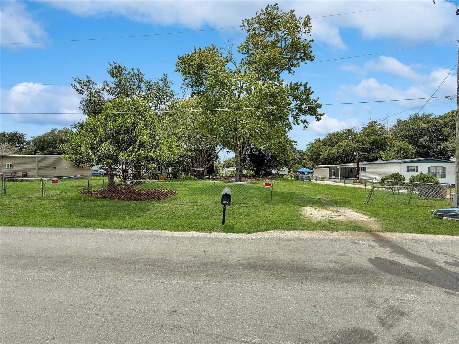 If you want a lot that is ready to be built on or a good place of land this lot is perfect for you! This lot has already been cleared and graded, it is primed and ready for a new building or setup. Since this lot used to have a mobile home on it, the lot already has water and electricity already installed! You will save a lot of money and time with these vital features already being installed, as well as their being no impact fees for a new building! Located in the heart of Central Florida, be minutes away from all of Florida’s major highways and expressways, as well as many of Florida’s exciting attractions! Finally, there is no HOA. Come make your dream home a reality or find an amazing location for your mobile home!