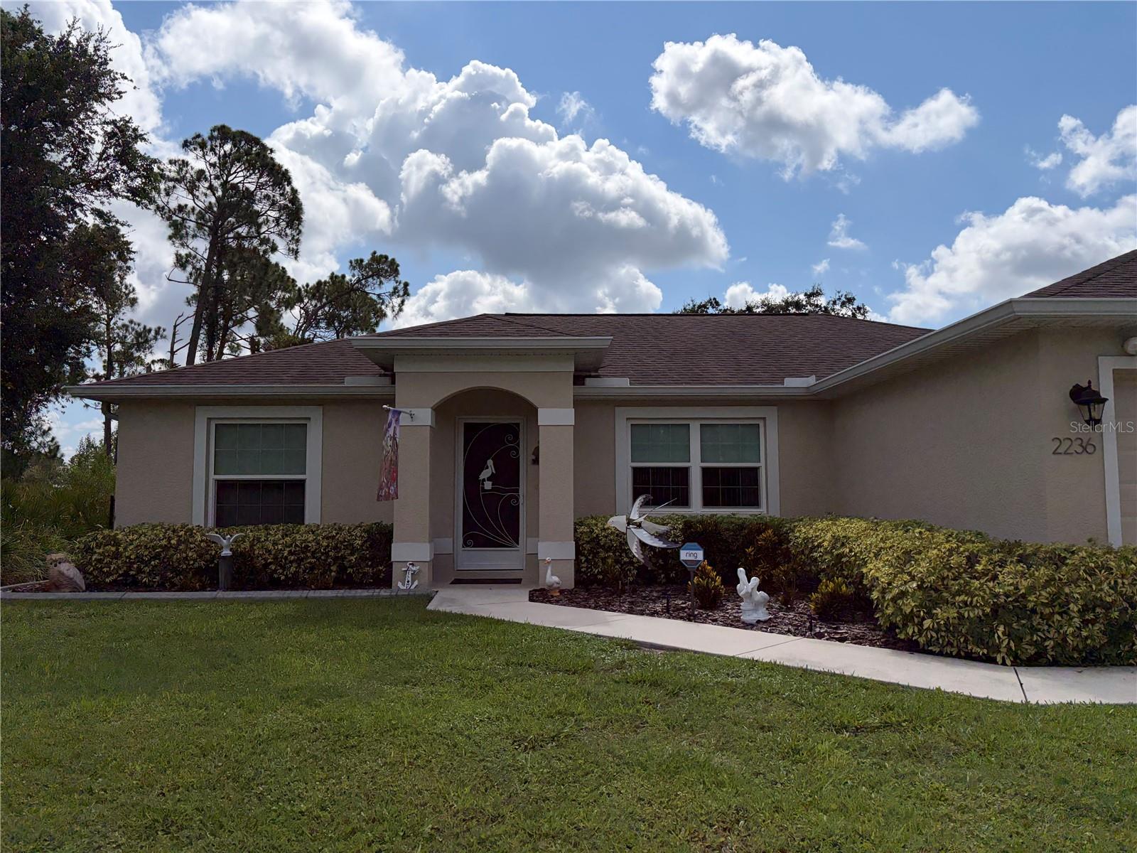 Better than new and loaded with premium upgrades, this beautifully maintained 3-bedroom, 2-bath GulfStar home is a rare opportunity in one of North Port's most desirable neighborhoods. Built just 7 years ago with quality craftsmanship, the current owners have invested in thousands of dollars of additional improvements, including a 7.2 kW solar panel system with a 20 kW battery backup for exceptional energy savings and whole-home backup power, a whole-house reverse osmosis system, Ring security system, fenced backyard, custom landscaping, decorative curbing, and more.

The open split-bedroom floor plan features vaulted ceilings, porcelain tile throughout, impact-rated Low-E PGT windows, granite countertops, stainless steel appliances, and full-overlay cabinetry. Situated on a spacious ¼-acre lot, the outdoor living space offers a screened lanai, paver patio, lush landscaping, irrigation system, gutters, and plenty of room to relax or entertain.

Located in Flood Zone X with convenient access to I-75, US-41, shopping, dining, golf, beaches, medical facilities, CoolToday Park, and Charlotte Sports Park, this home was thoughtfully designed for efficiency, durability, and low-maintenance living. With extensive upgrades already completed and exceptional features rarely found together at this price point, this move-in-ready home offers outstanding value and is one buyers won't want to miss. Schedule your private showing before this exceptional opportunity is gone.