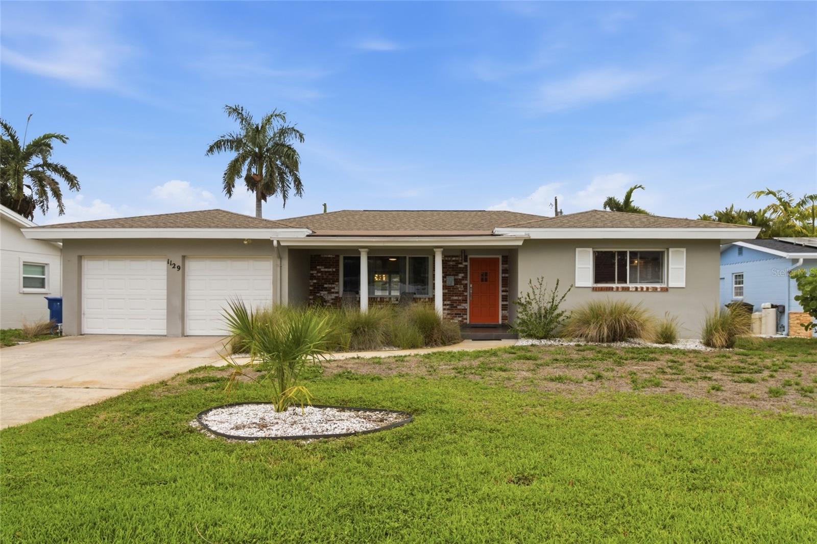High and dry in Northeast St. Petersburg, this home did NOT flood during recent storms. Welcome to 1129 39th Ave NE in St. Petersburg, located in the desirable Northeast Park Shores neighborhood, one of the most sought-after areas in the 33703 zip code thanks to its waterfront parks, boating access, and quick drive to downtown. This 3-bedroom, 2-bath home with 1,726 square feet offers comfortable living on a quiet, low-traffic street in the popular 33703 zip code, just minutes from waterfront parks and downtown St. Pete. A brand new roof will be installed prior to close! Inside, you’ll find a bright, flowing layout with a spacious family room overlooking the backyard, creating a welcoming space for everyday living or entertaining. The updated kitchen blends style and function with quartz countertops, stainless steel appliances, custom cabinetry, a pantry with rollout drawers, and bar seating perfect for casual dining. The primary suite features a renovated ensuite bath with a step-in tile shower, while two additional bedrooms and an updated hall bath provide comfortable accommodations for family or guests. Outdoor living is just as appealing with a covered front porch and a large backyard with plenty of space for a future pool, garden, or outdoor entertaining area. The location is another major advantage. Just around the corner is Crisp Park, where residents enjoy public boat ramps into Smacks Bayou, waterfront walking paths, playgrounds, and picnic areas. Nearby Coffee Pot Bayou offers scenic waterfront biking and walking routes, while downtown St. Petersburg’s restaurants, museums, and waterfront parks are only minutes away. Everyday convenience is close by with shopping and groceries at Publix, Whole Foods Market, and nearby neighborhood retail, plus quick access to 4th Street N and I-275 for commuting across Tampa Bay. If you’re searching for a move-in-ready Northeast St. Petersburg home that did not flood, with updated interiors, a large yard, and easy access to boating and downtown, 1129 39th Ave NE delivers the location and the lifestyle you are looking for.