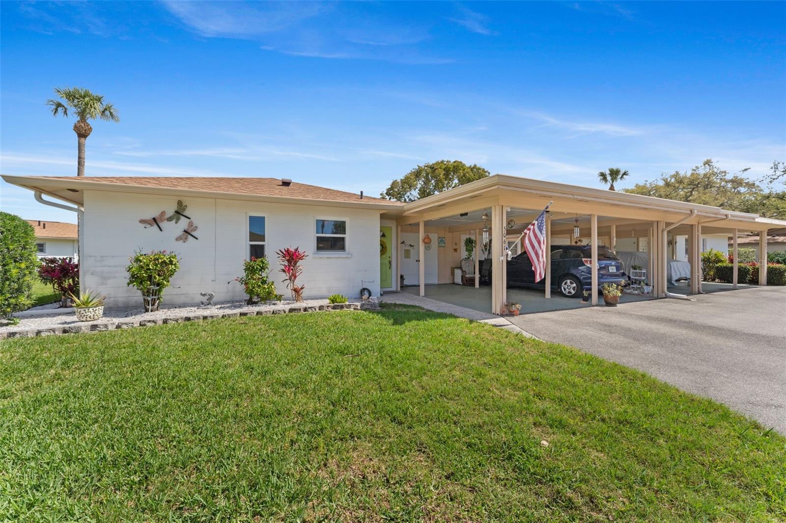 Virtually Staged. Great opportunity to own a maintenance-free, end unit villa in West Bradenton with no age restrictions. This move in ready home features a bright and functional layout with a glassed in lanai that provides additional living space for year round enjoyment. The property includes an interior washer and dryer, an attached carport with parking at your door, and over $30,000 in recent upgrades. Major components are less than 3 years old including impact windows, new HVAC system, new roof, and all new appliances, offering comfort and peace of mind.

Located just steps from the community clubhouse with a heated pool, shuffleboard, billiards, library, and planned social activities, plus a scenic pond for fishing. The well maintained community features beautifully landscaped grounds and a quiet residential feel.

Situated in Flood Zone X and just minutes to Anna Maria Island and the Gulf beaches, with convenient access to shopping, dining, and medical facilities. A fantastic opportunity and excellent value in today’s market.