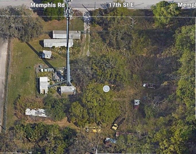 Pre-Construction. To be built. Industrial land opportunity with existing telecommunications tower income in a rapidly growing industrial corridor of Palmetto, Florida. The property features a long-term cell tower lease producing recurring revenue, a 5,000-square-foot building package included with the sale, and future development or owner-user potential. Strategically located near Port Manatee, US-41, US-301, and Interstate 75, the property offers investors and operators a unique combination of current income and long-term industrial land value. Property is available individually or may be purchased together with the adjacent 2103 17TH Street E property as part of a 4.78-acre industrial assemblage.