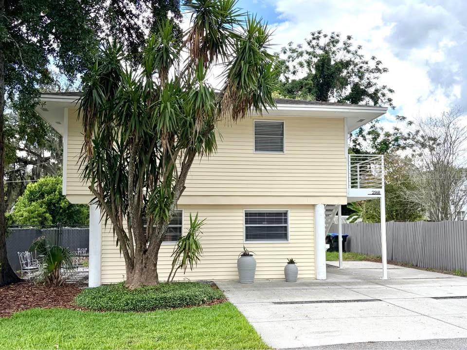 Virtually Staged. Conveniently located just minutes from I-4, downtown Orlando, and Winter Park, this versatile home offers the perfect blend of comfort, flexibility, and location. The upper level features two bedrooms and one full bath, while the lower level includes one bedroom and one full bath. Each floor has its own private entrance and full kitchen, making it ideal for multi-generational living, rental income, a guest suite, or added privacy.

Situated on a beautiful, tree-lined dead-end street, the property offers a peaceful setting while remaining close to shopping, dining, and entertainment. Inside, you'll find contemporary fixtures, stylish finishes, updated appliances, and an abundance of natural light throughout. The spacious backyard and inviting seating area provide the perfect space to relax or entertain family and friends.

Major updates include a recently replaced roof, HVAC system, and electrical panel, offering added peace of mind. Some photos have been virtually staged to help showcase the home's layout and potential.