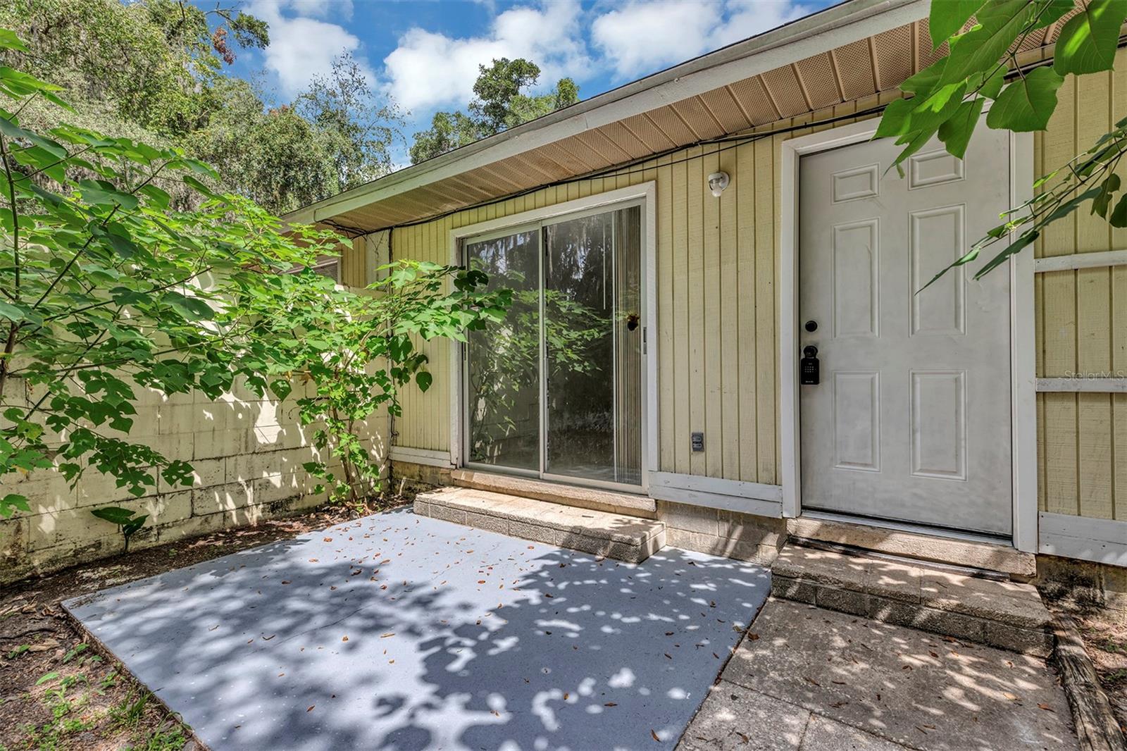 Welcome home to 3990 SE 17th Ct, Ocala, FL! This freshly painted 2-bedroom, 1-bath home offers a bright, inviting atmosphere with thoughtful features throughout. The spacious kitchen is equipped with stainless steel appliances, a dual-basin sink, and plenty of cabinet and counter space, making meal preparation and everyday living both convenient and enjoyable.

The living area is enhanced by ceiling fans and a sliding glass door that fills the space with natural light while providing easy access to the small open patio—an ideal spot to relax outdoors. With its fresh updates, functional layout, and convenient location near shopping, dining, schools, and major roadways, this charming home is ready for you to move in.

Schedule your showing today and discover everything this Ocala home has to offer!