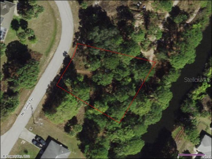 Beautiful, wooded, freshwater canal, oversized lot located in the heart of North Port.  Drink your morning coffee, kayak, paddleboard, or enjoy gorgeous Florida sunsets from your very own back yard waterway.  If you are thinking of building or investing in real estate, this may be the perfect property for you.  Close to boating, fishing, shopping, beaches, restaurants, schools, public boat ramps and area attractions.  Adjacent lot (36) is available for sale on a separate listing