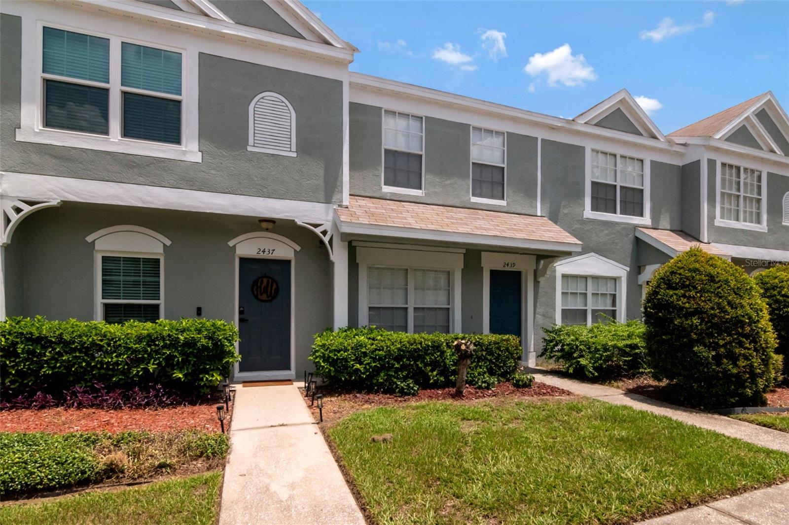 Virtually Staged. Move-in ready 2-bedroom, 2.5-bath townhome in the highly desirable gated Regency Key community! This beautifully updated home features a remodeled chef's kitchen with brand-new stainless steel appliances, luxury vinyl plank flooring, fresh interior paint, and new carpeting throughout. The spacious living room offers the perfect space for relaxing or entertaining, while the convenient half bath is located on the first floor. Upstairs, you'll find two generously sized bedrooms, each with its own bathroom for added privacy and comfort. Enjoy peaceful views with no rear neighbors as the home backs directly to the community pool, providing easy access to resort-style amenities. This turnkey property combines modern updates, an ideal layout, and an unbeatable location—ready for you to move right in!