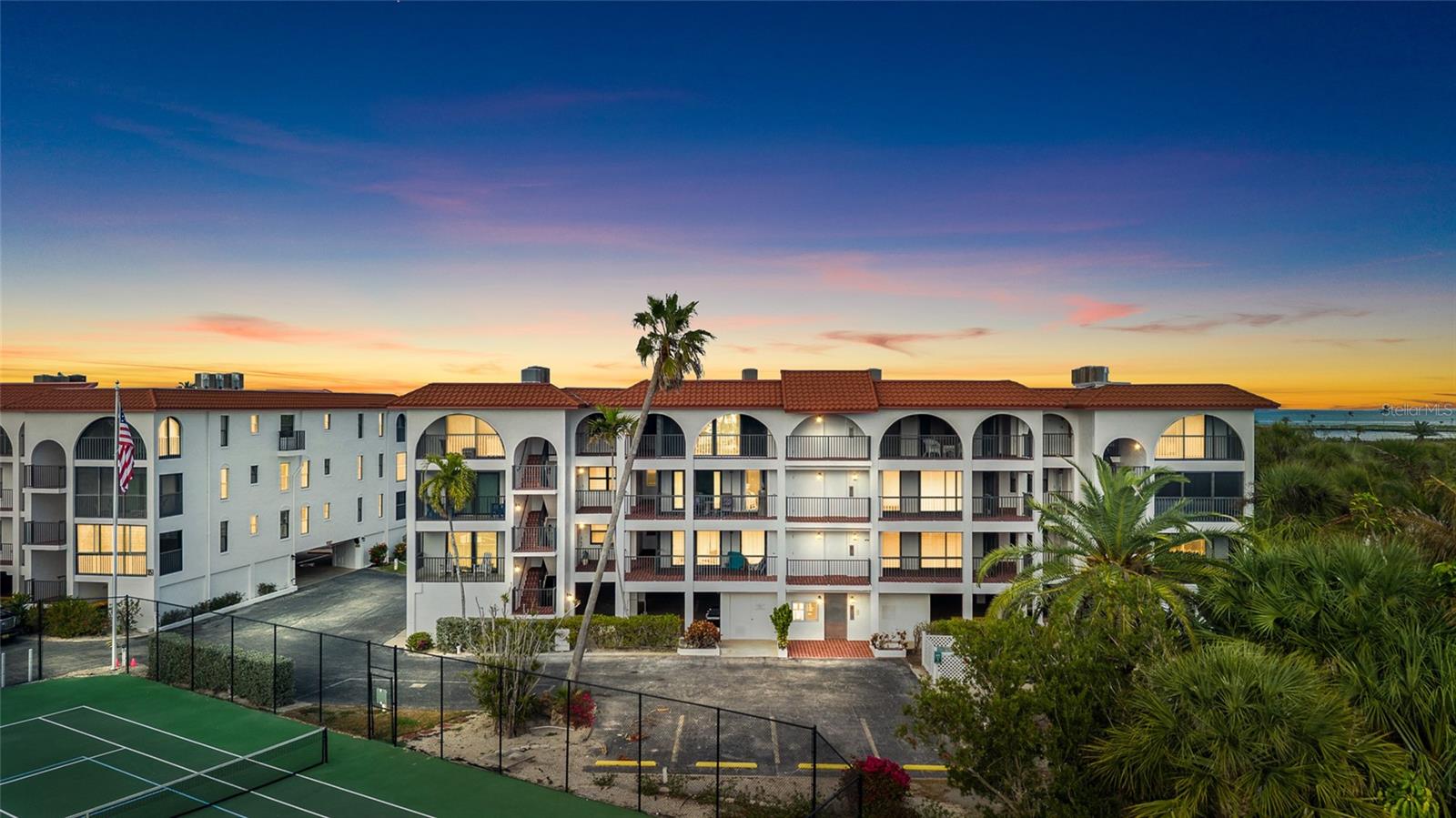 THIS IS YOUR CHANCE…BE THE 1st TO OWN ONE OF THE BEST - Welcome to a nearly new and walk-in ready condominium near the heart of the Boca Grande Historic Village - 950 Silver King Palm Avenue Unit 101 - a completely remodeled 1st-floor, end unit with a very short walk to the sandy beaches of the Gulf of America. AFTER THREE+ YEARS OF HARD WORK SILVER KING CONDOMINIUMS ARE BACK AND MUCH BETTER THAN EVER. Only final finishing details (mainly lush landscaping) remain! This property offers a coastal modern living space of 1,765 sq ft plus two fabulous screened porches-east and west thoughtfully designed with high end finishes throughout. As you come directly straight up steps (or elevator if desired) you are greeted by breathtaking natural light through all the many new impact doors and windows with an elongated screened porch that offers sunrise views that promise to start each day the brightest. This condo features a waterfront master bedroom and bathroom and two additional guest bedrooms and bathroom with lots of storage and additional screened porch facing west. The en-suite master bedroom and bathroom provides a serene retreat with its contemporary fixtures and finishes. For those who love the water, this property includes a convenient boat slip with inland waterfront views of the Boca Grande Bayou, ICW and the Gasparilla Inn Golf Course out to Charlotte Harbor (incredible moon and sunrises) - all ensuring endless aquatic adventures right at your doorstep. The Silver King is tucked into a quiet neighborhood and offers a community swimming pool, tennis/pickleball court and gas grills, with picnic and fish cleaning tables for waterfront courtyard boat side gatherings. Additionally, convenience is key with the elevator for easy access and the designated parking space. Also designated golf cart parking, boating and fishing tackle storage locker and additional paddleboard, canoe, kayak storage and more. Dockside patio complements a lush, mature waterfront courtyard with lots of privacy. The Clubhouse features a sundeck surrounding the pool and hot tub, two indoor saunas with bathrooms, the community gathering room and catering kitchen. Located near the heart of Boca Grande’s Historic Village, this condo offers unparalleled access to charming shops, exquisite dining options, and vibrant community events. Whether you’re looking for a peaceful playground or an active lifestyle, 950 Silver King Palm Avenue Unit 101 presents an exceptional opportunity to experience the best of the Condominium Lifestyle Boca Grande has to offer.