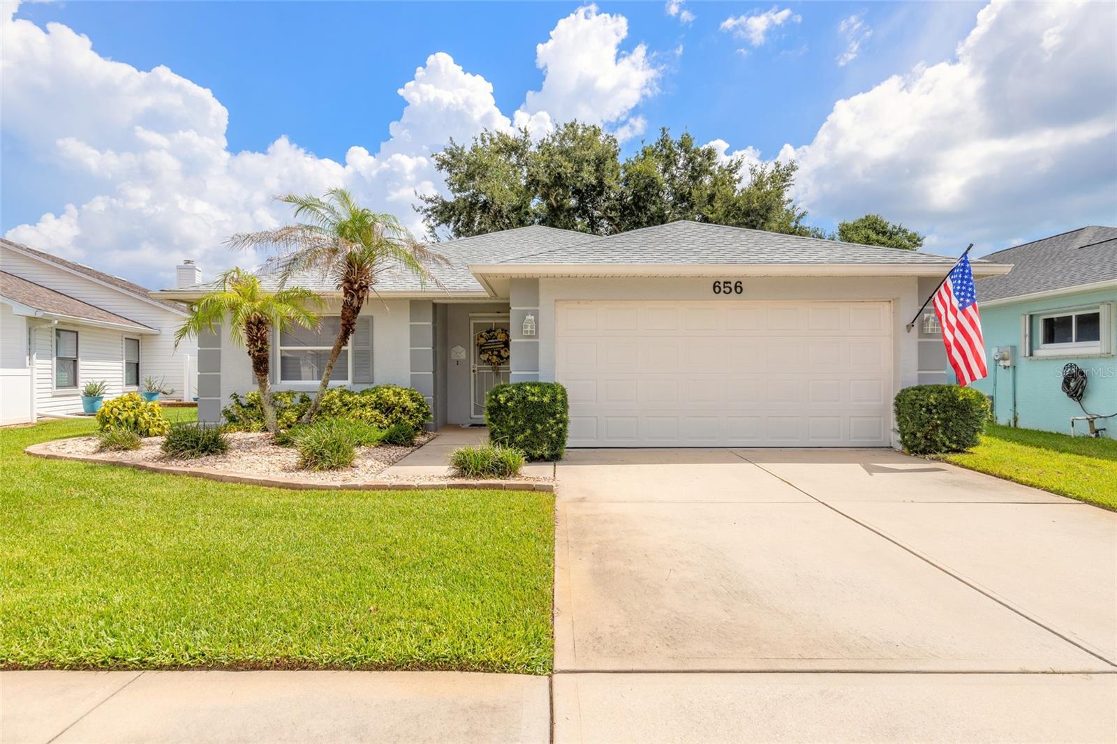 Move right in and start your next chapter in this beautifully remodeled 3-bedroom, 2-bath home offering 1,567 square feet of stylish, functional living space. Thoughtfully renovated in 2022 following Hurricane Ian, this home combines modern finishes with the confidence of major system updates, making it an exceptional opportunity for first-time buyers, downsizers, or anyone seeking a truly turnkey property. The inviting open layout creates a seamless flow between the living, dining, and kitchen areas, providing the perfect space for everyday living, family gatherings, or entertaining friends. Natural light fills the home, creating a warm and welcoming atmosphere that instantly feels like home. Designed for peace of mind, this property features durable concrete block construction, a new roof installed in 2023, a 2017 HVAC system, and a water heater replaced in 2022. The spacious 2-car garage offers additional storage, giving you plenty of room for vehicles, hobbies, and outdoor gear. Whether you're purchasing your very first home or looking for a low-maintenance property with the major updates already completed, this home delivers the perfect blend of comfort, style, and value. Simply unpack, settle in, and enjoy everything homeownership has to offer. Conveniently located near shopping, dining, schools, parks, and just a short drive to the beautiful beaches of New Smyrna Beach, you'll enjoy the best of Florida living while coming home to a property that's been thoughtfully updated and move-in ready. All information is intended to be accurate, however not guaranteed.