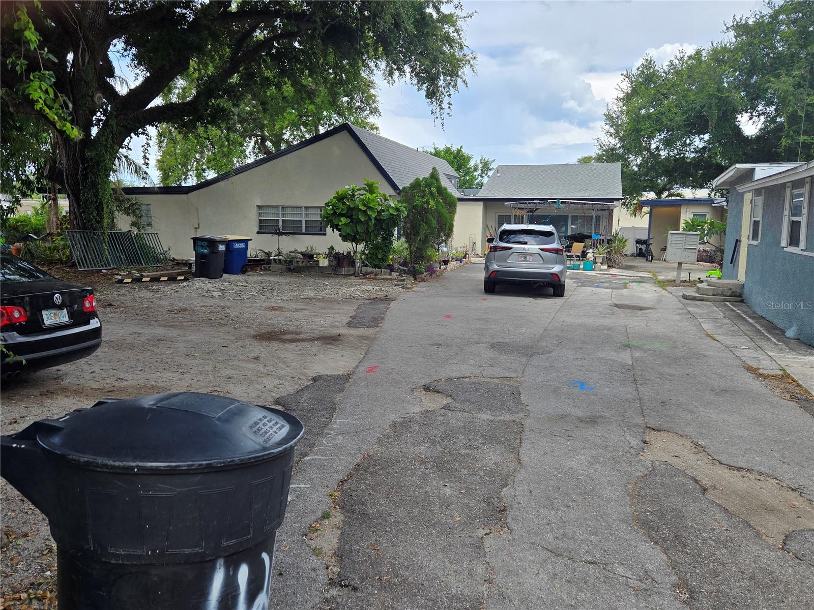 This expansive single-family home not only offers 4 bedrooms and 3 full bathrooms spread over 2,862 sq ft, but also includes two additional duplexes, yielding a total of 4 units ripe for rental income. All buildings on property are to be sold together. The first duplex (1120 & 1120 ½) features 2 bedrooms and 1 bathroom /each unit, while the second duplex (1124 & 1124 ½) offers a mix of 2 bedrooms, 2 bathrooms, and 1 bedroom, 1 bathroom respectively. Perfectly situated near shopping, a recreation and aquatic complex boasting indoor basketball courts, fitness center, seasonal pool, and lush public parks, this property is a haven for both homeowners and tenants alike. With a half acre of land and total living space of 5,470 sq ft across all units, sitting at the end of a cul-de-sac plus ample parking to accommodate tenants, it's time to seize this golden opportunity today! 2 of the units are occupied so please do not disturb tenants. Sold As-Is, Homeowner requests listing agent present at all showings; 24 hour notice required.