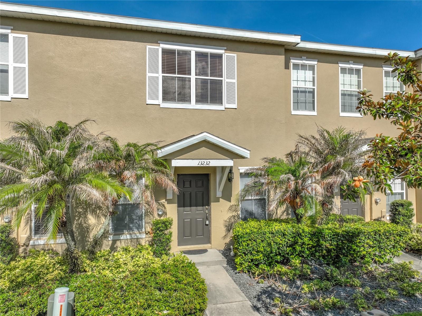 Welcome to this beautifully maintained unfurnished 2-story townhouse located in the gated community of Daniels Landing. Surrounded by attractive landscaping, this charming 2-bedroom, 3-bath home offers a spacious and functional layout designed for comfortable living. Step inside to find a freshly repainted interior, high ceilings, laminate flooring, and an open-concept floor plan that seamlessly connects the combined living and dining areas, creating an inviting space for both relaxing and entertaining. The kitchen is equipped with stainless steel appliances and offers ample cabinet and counter space for everyday convenience. Upstairs, the spacious primary suite features a private ensuite bath, providing a peaceful retreat at the end of the day. Additional highlights include a 2-car garage and a private enclosed courtyard with vinyl fencing—perfect for outdoor dining, entertaining, or enjoying your own quiet outdoor space. Located in the desirable gated community of Daniels Landing, this home combines comfort, style, and convenience in one exceptional property.