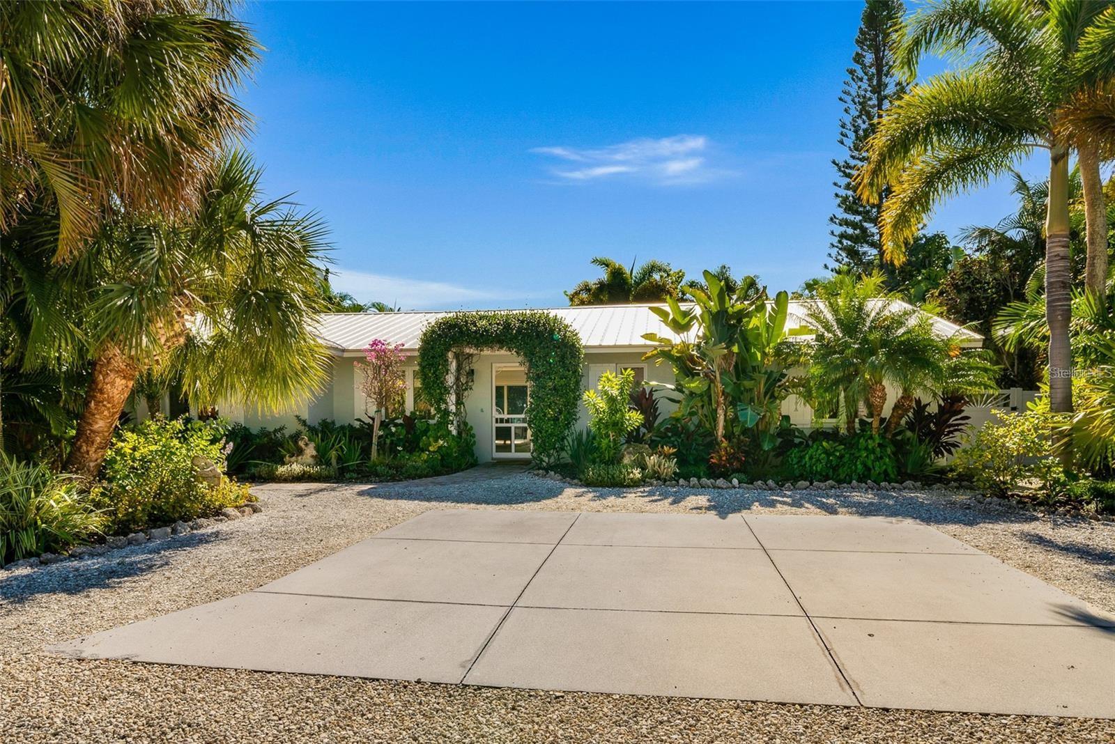 This completely updated Anna Maria Island 3 bedroom 2.5 Bathroom pool home is situated on a cul-de-sac, and features hurricane-rated windows, metal roof, concrete block construction and garage. Property is in a Weekly rental zone with a successful rental history, making this BEAUTIFUL BEACH HOME a perfect investment property, or family get away. Just 3 short blocks to the white sandy beaches of the GULF OF MEXICO and walkable to restaurants, establishments offering live music and charming shops making driving optional once you arrive! The kitchen and great room features an entire wall of sliding doors opening to the sunny south-facing outdoor living space and heated pool. The Master Retreat also opens to the pool area and features a master bath with walk-in shower, dual sink vanity and walk-in closet. A second Master suite and an additional 3rd bedroom with custom built in bunks make this gorgeous home spacious and functional for your family to comfortably relax both indoors and out. New Kitchen, new appliances, new bathroom vanities, new light fixtures, new pool equipment… and situated on an oversized lot, with an oasis backyard surrounded by tropical landscaping, paver decking, and a heated pool. Home is being sold TURN KEY FURNISHED with decorator finishes! This one won't last!