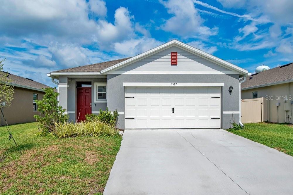 Call this beautiful newly built residence home! Offering 4 spacious bedrooms, 2 full bathrooms, and approximately 1,665 square feet of modern living space, this pet-friendly residence combines comfort, style, and convenience in one exceptional rental opportunity.
Upon entering the home, you're greeted by a welcoming foyer with convenient access to a storage closet and laundry room. Just beyond, the home opens into a spacious kitchen featuring stone countertops, stainless steel appliances, abundant cabinetry, a walk-in pantry, and a breakfast bar perfect for casual dining or meal prep.
The kitchen flows seamlessly into the dining area and expansive living room, creating an open-concept layout ideal for both everyday living and entertaining. Large windows fill the space with natural light, while a glass door extends the living area outdoors to a covered rear patio. Overlooking a generously sized backyard, this outdoor space is perfect for relaxing, grilling, entertaining guests, or giving pets room to play.
The thoughtfully designed split-bedroom floor plan provides privacy and functionality. The primary suite is situated toward the front of the home and features a spacious bedroom, walk-in closet, and private ensuite bath. Three additional bedrooms are located along a separate hallway and share a full bathroom, making them ideal for family members, guests, or a home office.
Energy efficiency is a standout feature of this property, which includes an installed solar system that helps lower monthly electricity costs, resulting in a reduced electric bill. Electric car owners will be pleased to find an electric vehicle charger already installed in the garage, making it convenient to charge your EV.
Encourage younger family members to burn their energy by visiting the community playground or taking a refreshing dip in the pool to cool off from the summer heat. Both activities provide the perfect opportunity to relax and connect with your neighbors, fostering a sense of community while enjoying the outdoors.
 Conveniently located near major highways, shopping, dining, entertainment, schools, and Orlando Sanford International Airport, this home combines suburban comfort with easy access to everything Central Florida has to offer.