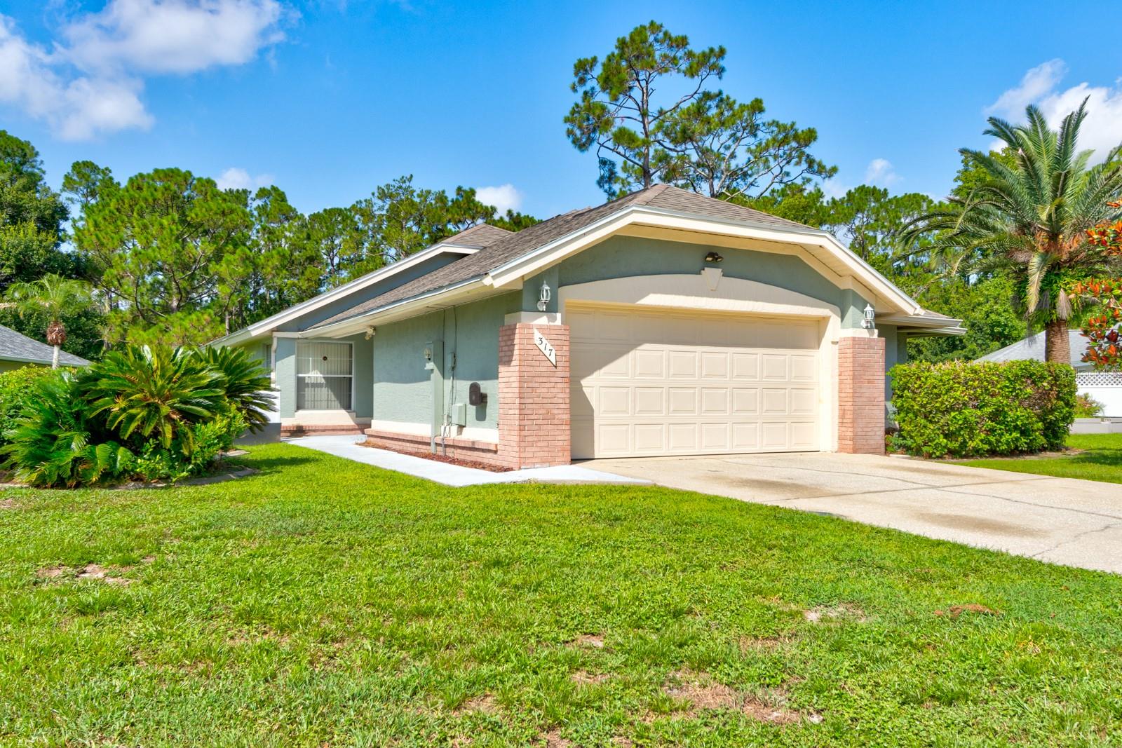PRICED TO SELL!! This 3 bed 2 bath home is the perfect starter for a family wanting more than the average lot and block. Beautifully maintained! Sitting at the end of a cul-de-sac in the well-established neighborhood of Indigo Lakes, it offers a large living room with not just one enclosed porch but TWO! The Florida room is under air that leads to the enclosed porch perfect for your plants, morning coffee or evening relaxation looking out into your large backyard tree line. The Master has a generous walk-in closet within the skylit bathroom. Another large walk-in closet is located in the hallway leading to the guest bath and another bedroom. Brand new carpet throughout. Newer kitchen appliances aside from the dishwasher (does not work). Water heater 2026, 2021 Roof and AC is original to the home but don't fret! It blows ice cold air. The home needs some TLC and a little updating reflected in the price. All information is deemed to be accurate but cannot be guaranteed.
