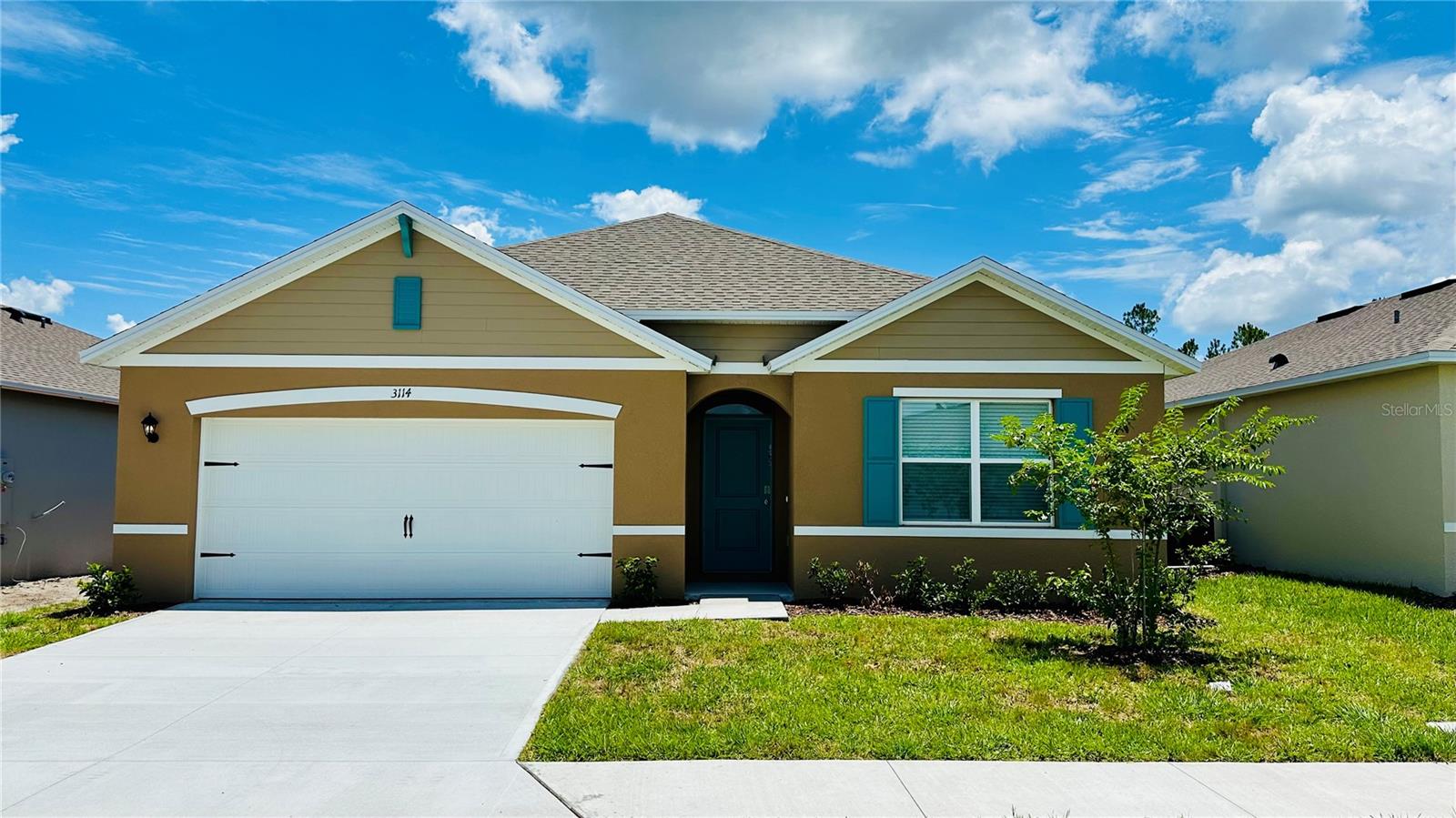 Welcome to this brand-new 4-bedroom, 2-bathroom home located in the desirable Lake Deer Community of Poinciana. Designed with comfort and modern living in mind, this beautiful residence features an open-concept floor plan with luxury vinyl flooring throughout the main living areas and plush carpet in all bedrooms for added comfort.

The spacious kitchen offers ample cabinetry, modern appliances, and a large island overlooking the living and dining areas, making it perfect for entertaining and everyday living. The private owner's suite features a generous walk-in closet and an en-suite bathroom designed for relaxation.

Step outside to the covered lanai and enjoy peaceful canal views, creating the perfect setting for morning coffee or evening gatherings. With its contemporary finishes, energy-efficient construction, and thoughtful design, this home offers the ideal combination of style and functionality.

Conveniently located near shopping, dining, schools, parks, and major roadways, residents of Lake Deer enjoy a growing community with easy access to everything Central Florida has to offer.

Don't miss this opportunity to own a brand-new home with water views in one of Poinciana's newest communities. Schedule your private showing today!