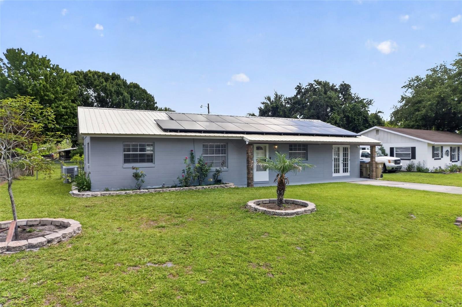 Discover comfort, convenience, and versatility in this 3-bedroom, 2-bath home, with fresh paint inside and out. Ideally located just minutes from The Loop’s shopping, dining, and entertainment, as well as schools and public transportation.

The functional floor plan features updated kitchen, solid-surface countertops, tile and carpet flooring, and a second kitchen that offers excellent potential for multi-generational living, extended family, guests, or a private in-law suite.

Enjoy the benefits of solar panels for improved energy efficiency and potential utility savings. Outside, the large fenced backyard provides plenty of room for pets, play, gardening, or entertaining. Unwind on the covered, partially screened porch, and take advantage of the storage shed for additional storage and organization.

Combining a convenient location, flexible living options, and valuable updates, this home is ready for its next owner to move in and make it their own.