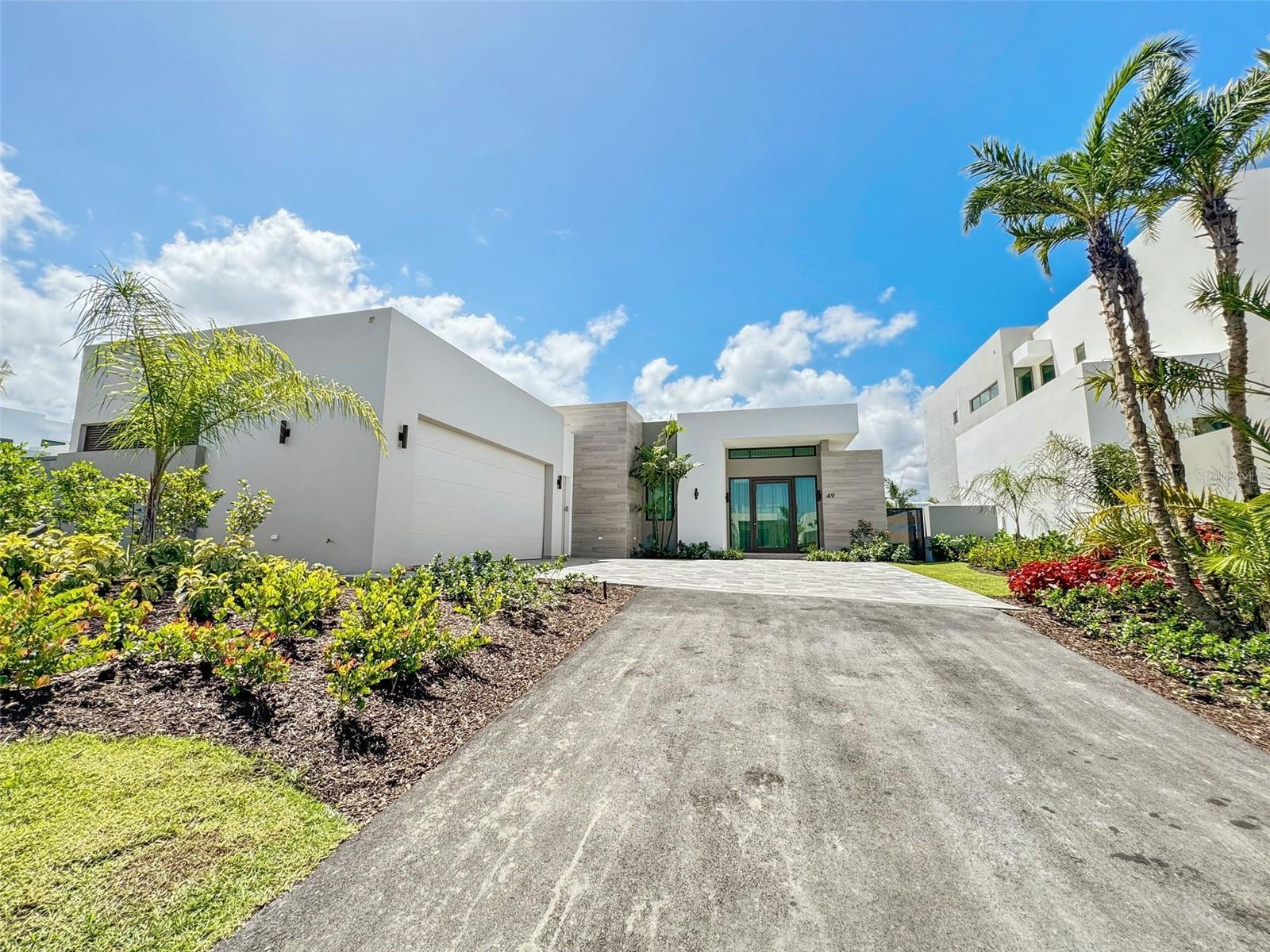 THE ISLES RESIDENCES AT DORADO BEACH - Residential