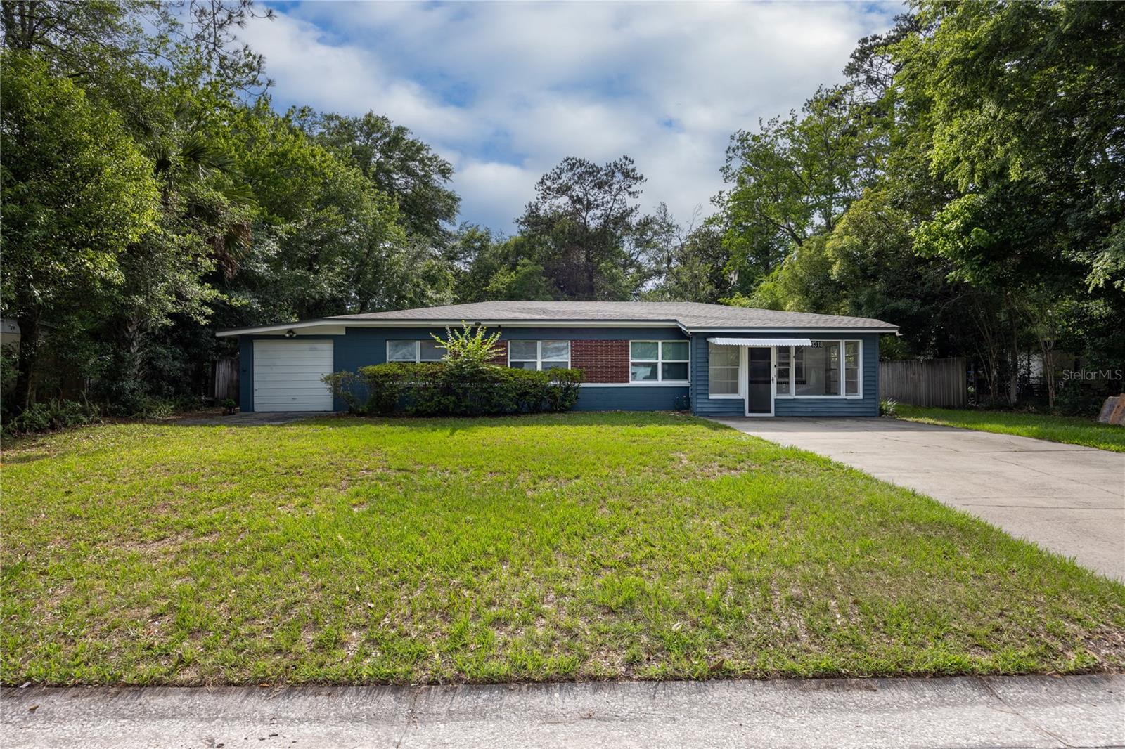 Welcome to this move-in-ready Gainesville home offering comfort, convenience, and valuable recent updates. Located in an established neighborhood, this property provides easy access to downtown Gainesville, the University of Florida, shopping, dining, parks, and major roadways.

Step inside to discover a fresh, updated interior featuring brand-new flooring and fresh paint throughout, creating a bright and inviting atmosphere. The functional floor plan offers comfortable living spaces perfect for both everyday living and entertaining.

Major improvements provide peace of mind for years to come, including a new roof installed in 2023 and a new water heater installed in 2025. These significant upgrades add value while reducing future maintenance concerns.

Outside, the spacious yard offers plenty of room for outdoor activities, gardening, pets, or simply enjoying Florida’s beautiful weather. Whether you’re a first-time homebuyer, downsizing, or seeking an investment opportunity, this residence presents an excellent combination of affordability, updates, and location.

Don’t miss your chance to own this refreshed Gainesville gem with modern updates and lasting value.