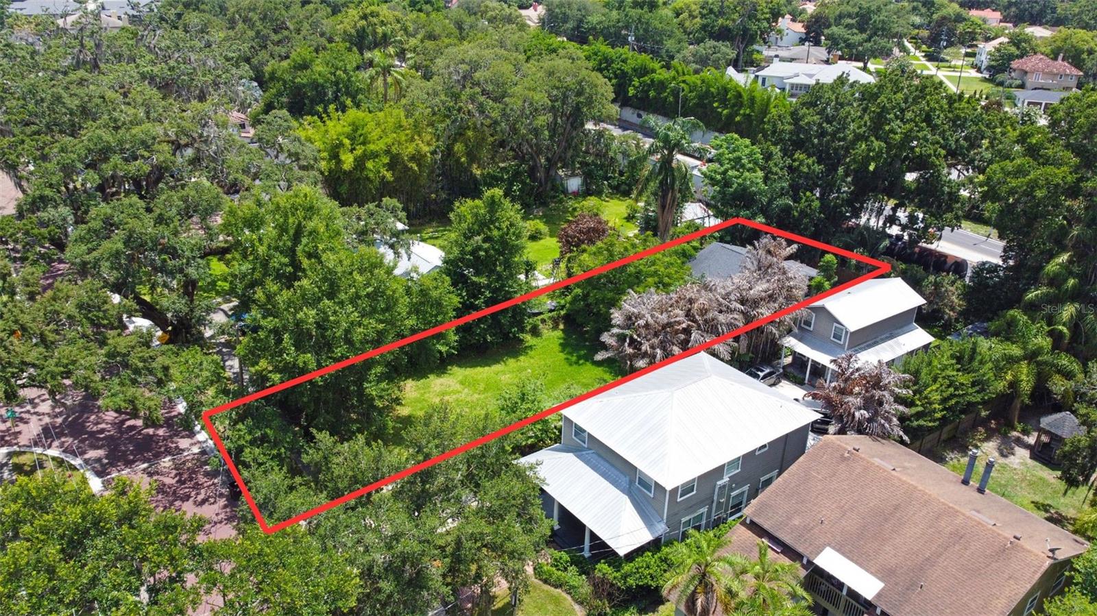 Discover the possibilities in the heart of College Park! Situated on a spacious R-2 zoned lot, this unique property offers endless potential in one of Orlando's most sought-after neighborhoods. The current home is a duplex with a kitchen and 1 bedroom/1 bathroom downstairs, while a kitchen and 2 bedrooms/1bathrooms is upstairs. Whether you're an investor looking for your next project, a builder searching for your next development opportunity, or a buyer with a vision to create something truly special, this property is packed with opportunity.

Unlike a vacant lot, this property already includes an existing duplex tucked toward the rear of the lot. With a little TLC, the duplex could continue serving as an income-producing investment, or you can take advantage of the R-2 zoning to reimagine the property and build your own duplex or custom project. The possibilities are only limited by your imagination and local zoning requirements.

Located in the heart of College Park, you'll enjoy the charm of tree-lined streets, beautiful parks, and a vibrant community known for its local restaurants, boutiques, coffee shops, and year-round events. Just minutes from Downtown Orlando, AdventHealth, Ivanhoe Village, The Packing District, and major roadways, you'll love the convenience while still enjoying the character that makes College Park one of Central Florida's most desirable places to live and invest.

Opportunities like this are becoming increasingly rare. Whether you're looking to renovate, redevelop, or build, this is your chance to secure a prime piece of College Park real estate.