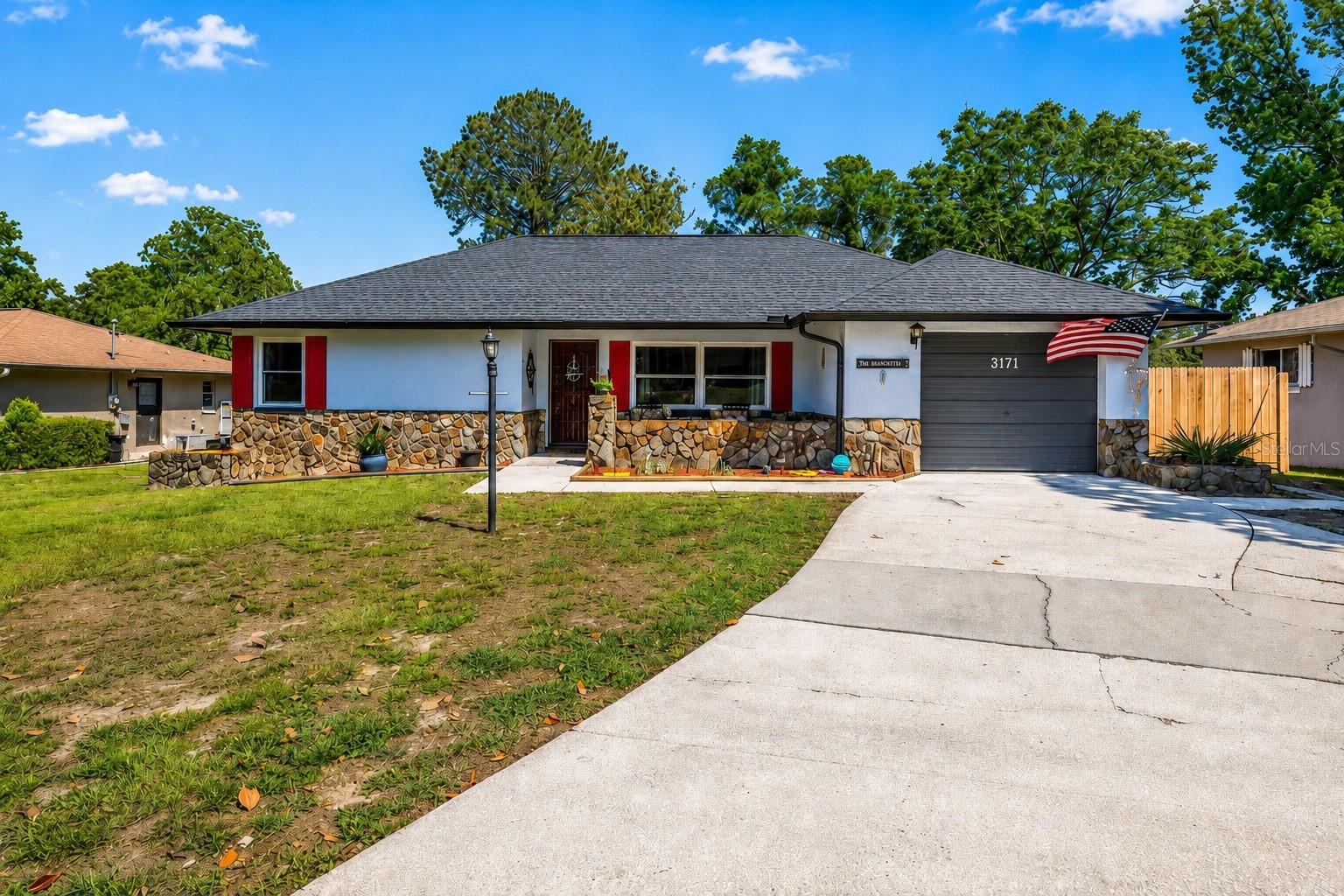 Looking for an affordable, move-in ready home in a desirable neighborhood? Look no further! This beautifully updated 2-bedroom home with a versatile bonus room, 1 full bath, 1 half bath, and a 1-car garage is packed with upgrades and located on a quiet road leading to a cul-de-sac—meaning no through traffic. Major improvements include a 2022 roof, 2017 energy-efficient windows, 2016 HVAC system, gutters surrounding the entire home, and a newer privacy fence. The spacious driveway offers plenty of room for guests, in addition to the 1-car garage. As you approach the home, you’ll appreciate the inviting front sitting area—perfect for enjoying your morning coffee while listening to the birds. Step inside to find a spacious living room highlighted by soaring vaulted ceilings that create an open and airy feel. The primary suite offers dual closets, while all rooms have been freshly painted and feature ceiling fans for added comfort. The kitchen has been tastefully refreshed with painted cabinetry, updated hardware, an upgraded sink, and a modern touchless faucet. The three flush-mounted kitchen lights offer adjustable brightness settings, adding both style and functionality to the space. There’s also a charming eat-in kitchen area perfect for casual dining. The beautifully updated half bath is conveniently located near the indoor laundry room and garage. Both toilets even feature built-in night lights for an added modern touch. A versatile bonus room, currently being used as a third bedroom, offers endless possibilities for a home office, hobby room, or additional living space. To top it all off, there’s a wonderful Florida room to enjoy year-round. And yes — there’s NO HOA! Plus, this home is connected to public water and public sewer, so there’s no need to worry about maintaining a well or septic system or paying additional HOA fees. All of this for just $214,900 — simply move in and start enjoying your new home!