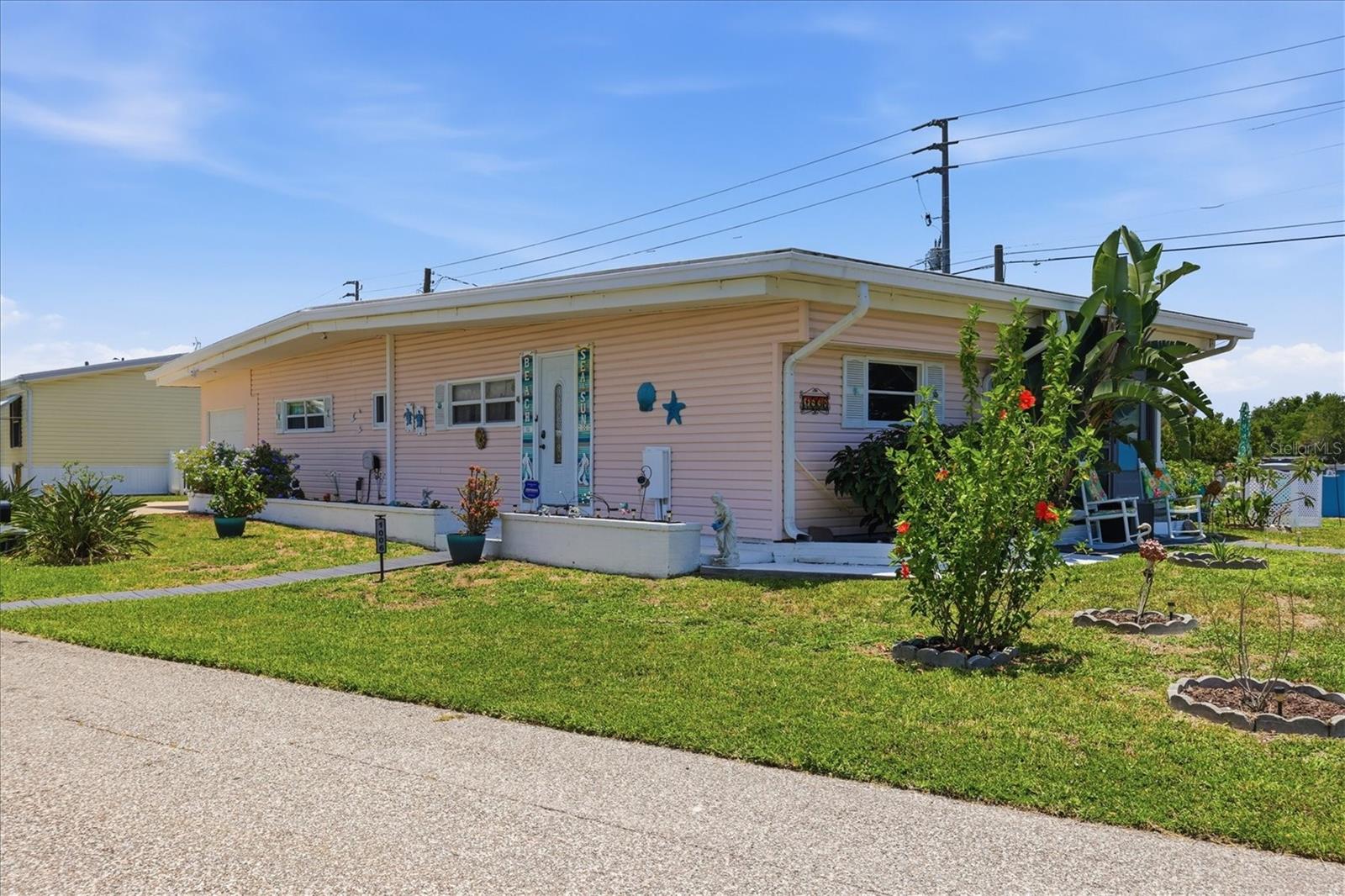 Welcome to Tidevue Estates, a desirable land-owned 55+ community where comfort and convenience come together! Situated on a spacious corner lot, this well-maintained home offers an updated kitchen featuring beautiful oak Craft Made soft-close cabinets, pull-out drawers, Lazy Susan storage, abundant counter space, new LED light fixtures, and plenty of room to add an island for additional seating and workspace. The bright living room showcases laminate flooring and two LED ceiling fan/light fixtures and flows seamlessly into the dining area, creating an inviting open living space. The Florida room provides extra square footage to relax, entertain guests, or enjoy your morning coffee. Major updates throughout the home provide peace of mind, including a newer roof, Maytag whole-home water filtration system, two mini-split A/C units, updated electrical system, updated kitchen and bathroom plumbing, and a freshly painted exterior. The laundry room is conveniently located inside the one-car garage, offering flexibility as a garage, golf cart parking, workshop, art studio, or home fitness space. Two storage sheds provide plenty of room for lawn equipment, tools, and hobbies. The oversized backyard offers endless possibilities for gardening, outdoor entertaining, or simply enjoying Florida's beautiful weather.  Low HOA of only $600 annually. Pets are not permitted. Plenty of activities to keep you busy in this community. Updated fitness center. Meet friends and make new ones for a game of indoor pickleball, bocce ball, or shuffleboard. Join the Golf League. Take a bike or golf cart ride to Veterans Park to watch the wildlife and enjoy the sunset. Ellenton Premium Outlet Mall, restaurants, and medical facilities are just minutes away. Easy access to I-75 to explore Sarasota. Not to mention a short drive to our beautiful Gulf Beaches. Don’t miss this opportunity—move in and start enjoying the Florida lifestyle today!Don't miss this move-in-ready home in the active Tidevue Estates community, where you own the land and enjoy the best of Florida living!