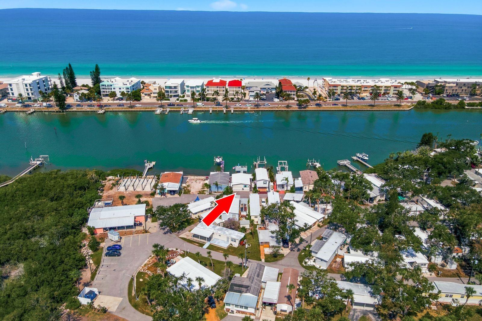 Own direct Intracoastal waterfront with a private dock for $325,000, a rare find on Florida's Gulf coast. Tucked into Coquina Cove, a resident-owned 55+ community in Largo minutes from Indian Rocks Beach, this 2 bedroom, 2 bath home puts boating, fishing, and sunset water views in your backyard. Step out to your private dock on the Intracoastal, a back patio, and a grilling area for entertaining. Inside, the home has been extensively renovated with a brand new kitchen, a shiplapped living room, a new stone shower, and updated electrical, and it is ready for your choice of flooring and finishing touches. Ownership includes the land as a 1/60 co-op share with a low $140 monthly fee, and short term rentals (one month minimum) are welcome for seasonal income. Residents enjoy a clubhouse and a large community dock for bigger gatherings, with beaches, restaurants, groceries, and medical close by. Your piece of paradise is waiting.