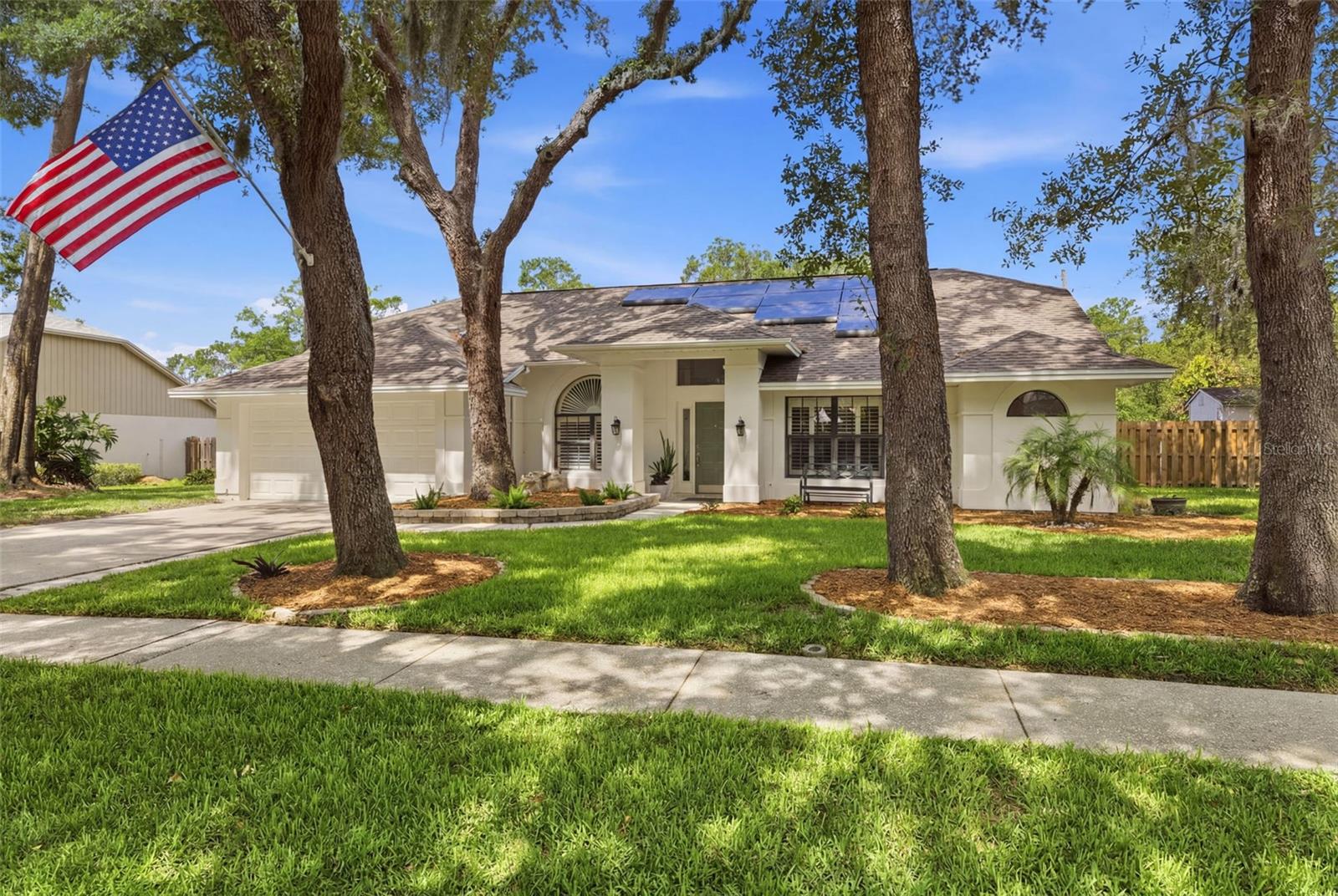 Welcome to this beautifully updated 4-bedroom, 2-bathroom pool home situated on a spacious oversized lot in one of Lutz's most desirable locations. Combining modern upgrades, energy efficiency, and ample outdoor space, this move-in ready property offers the perfect blend of comfort and functionality.

Step inside to discover stylish new flooring installed throughout in 2024 and a completely updated kitchen featuring modern finishes, abundant cabinetry, and a new refrigerator, creating the perfect space for everyday living and entertaining. The thoughtfully designed floor plan offers generous living areas, comfortable bedrooms, and seamless flow throughout the home.

Major improvements provide peace of mind for years to come, including a new roof (2024), professionally sealed A/C ductwork (2025), new fencing (2025), and newly added storage sheds (2026). One of the home's most impressive features is the state-of-the-art solar energy system installed in 2025, complete with a new electrical panel and advanced battery backup technology, helping maximize efficiency and reduce utility costs.

Outside, enjoy your own private backyard retreat featuring a sparkling pool and plenty of room to relax, entertain, garden, or store recreational vehicles and equipment. The oversized lot provides exceptional outdoor space rarely found in today's market.

With extensive recent upgrades, energy-efficient features, a large lot, and a refreshing pool, this Lutz home is truly a rare opportunity to enjoy Florida living at its finest.