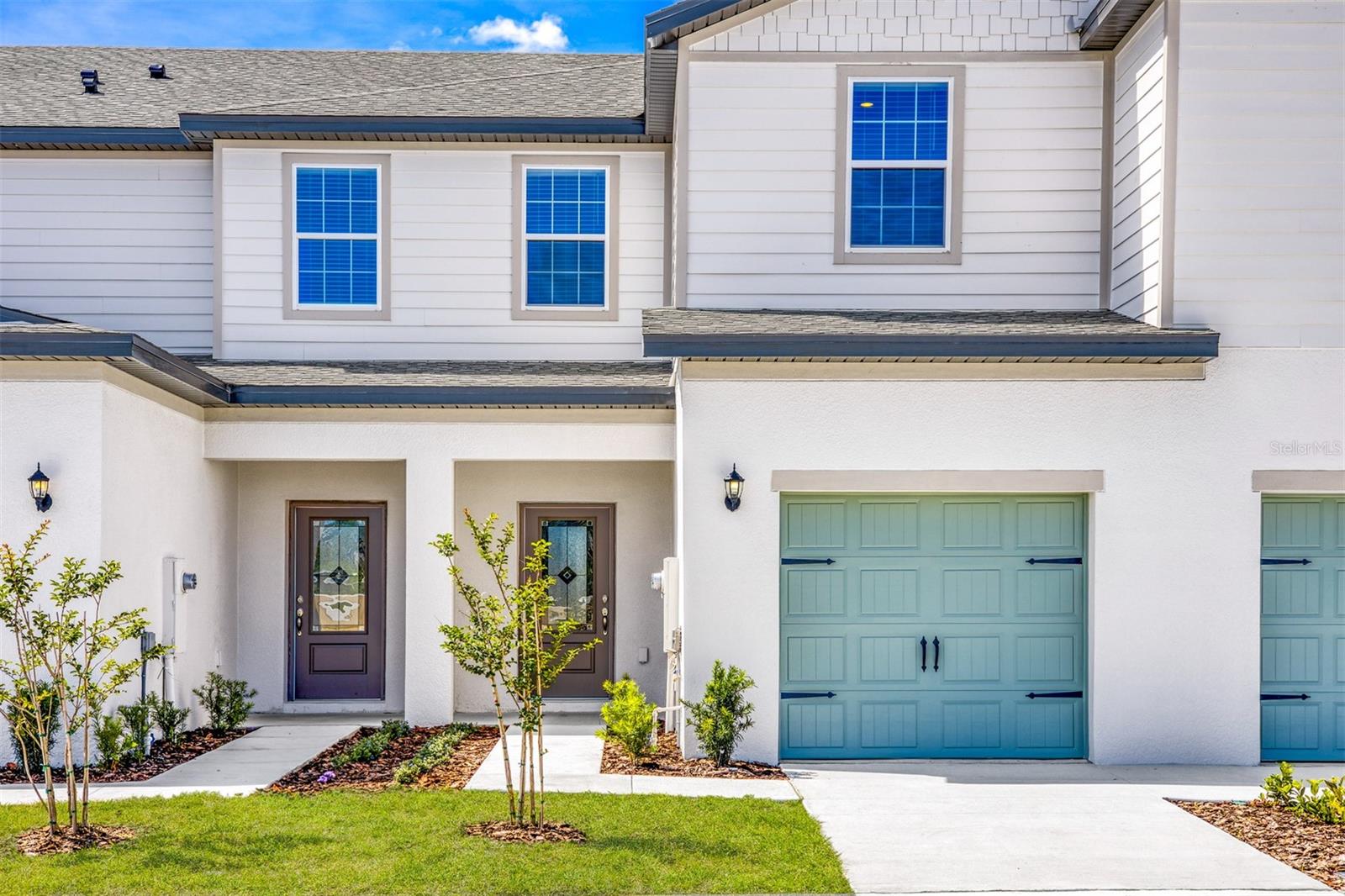 Discover the Pensacola at Sol Vista, a thoughtfully designed two-story floor plan offering style and functionality. The first floor features an open-concept living and dining area and a kitchen with granite countertops, stainless steel appliances, white cabinetry, and a pantry. Upstairs includes a spacious primary suite with a walk-in closet and private bath, along with additional bedrooms and a full bathroom. Energy-efficient features are included throughout. Conveniently located in Dundee with access to community amenities.