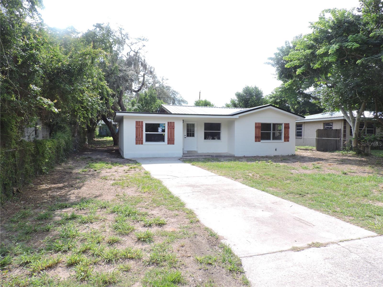 TOTALLY REDONE INSIDE AND OUT...AND MOVE IN READY!!  CALL TO PREVIEW THIS NICELY DONE 3 BEDROOM CB HOME WITH NEW METAL ROOF, BATHROOM UPDATED, CENTRAL H/A, NICE UPDATED KITCHEN. THE THIRD BEDROOM COULD BE A DEN OR FAMILY ROOM. A SPACIOUS BACK YARD WITH NEW SHED. DON'T DELAY CALL TODAY.