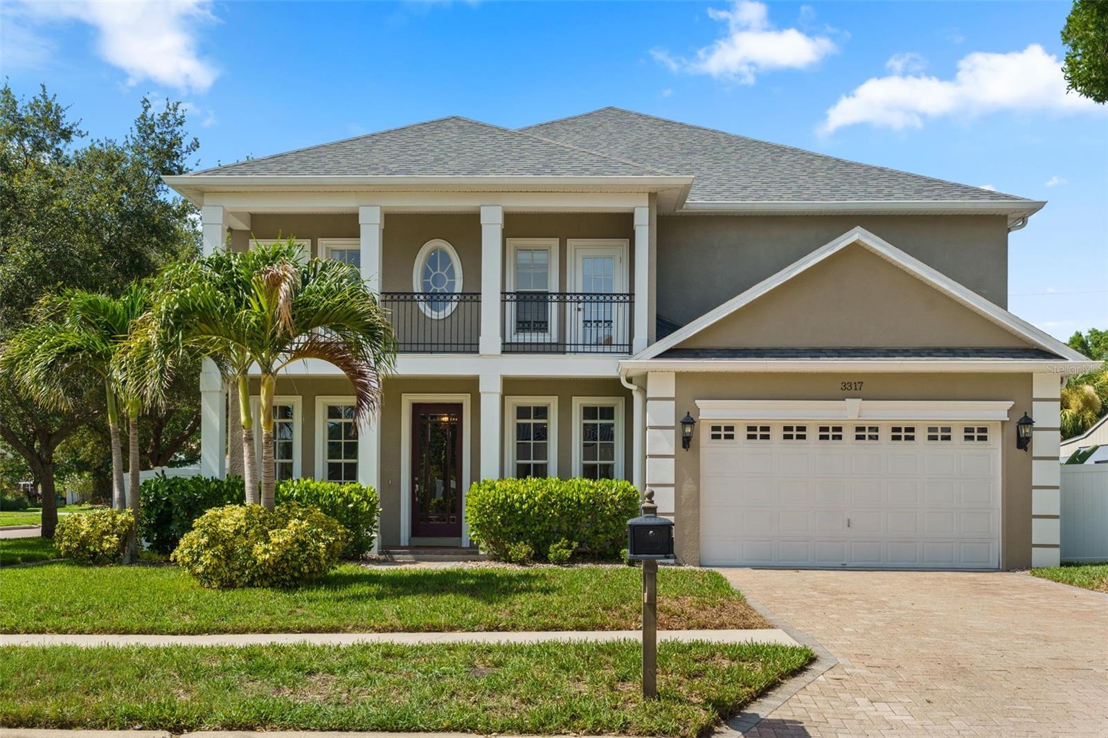 Nestled in the highly desirable Palma Ceia neighborhood, this beautifully appointed 5-bedroom, 4.5-bathroom pool home with a versatile bonus room offers an exceptional blend of elegance, comfort, and functionality. From the moment you step inside, you're welcomed by a formal living room and dining room, creating the perfect setting for entertaining and everyday living. The thoughtfully designed open floor plan flows seamlessly into the spacious family room and expansive kitchen, where a large center island with seating serves as the heart of the home. An additional  dining area provides plenty of space for family meals and gatherings. French doors open to the private backyard oasis, creating effortless indoor-outdoor living and leading to the sparkling pool. A first-floor bedroom with an en-suite bathroom offers flexibility for guests or multigenerational living. With direct access to the pool area, this bathroom also functions perfectly as a convenient pool bath. A separate powder room on the main level adds extra convenience for guests. Upstairs, the spacious primary suite is a true retreat, featuring a private balcony overlooking the backyard, a generously sized walk-in closet, and ample room to relax. Three additional bedrooms, two full bathrooms, and a versatile bonus room complete the second floor, offering plenty of space for a playroom, media room, or home office. Two of the secondary bedrooms share a charming front balcony, adding character and additional outdoor living space. Additional highlights include a whole-house water filtration system, providing filtered water throughout the home for added comfort and peace of mind. Located in one of South Tampa's most sought-after neighborhoods, this exceptional home combines spacious living, thoughtful design, and an unbeatable Palma Ceia location close to top-rated schools, parks, shopping, dining, and everything the area has to offer.