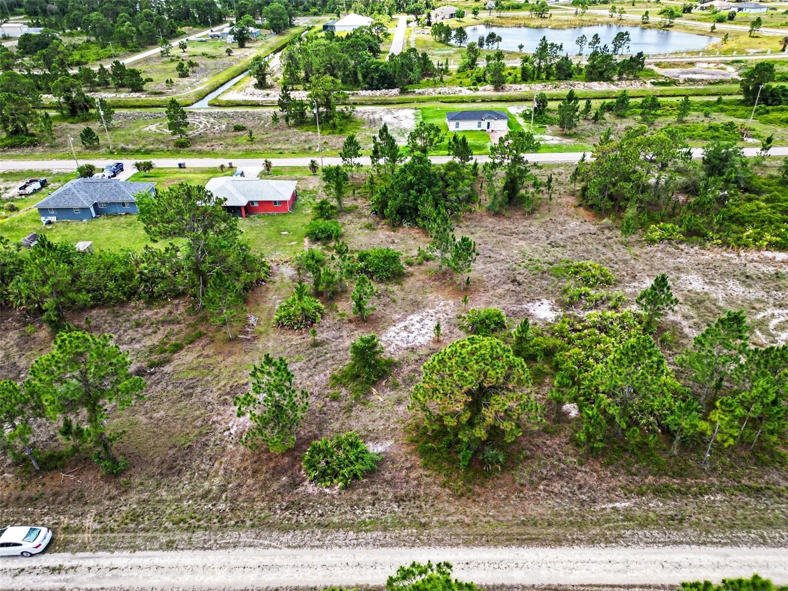 Fantastic opportunity to own a piece of Southwest Florida! This prime vacant lot is high, dry, and ready for your custom dream home or next investment build. Tucked into a fast-growing but wonderfully quiet residential pocket with barely any neighbors around, you can enjoy maximum privacy and build on your own timeline with absolutely no HOA fees. Strategically located just off SR-82, you are in a highly convenient location close to RSW airport and just a short drive to I-75, making commutes across Lee County an absolute breeze. Drive by today and start planning your future!