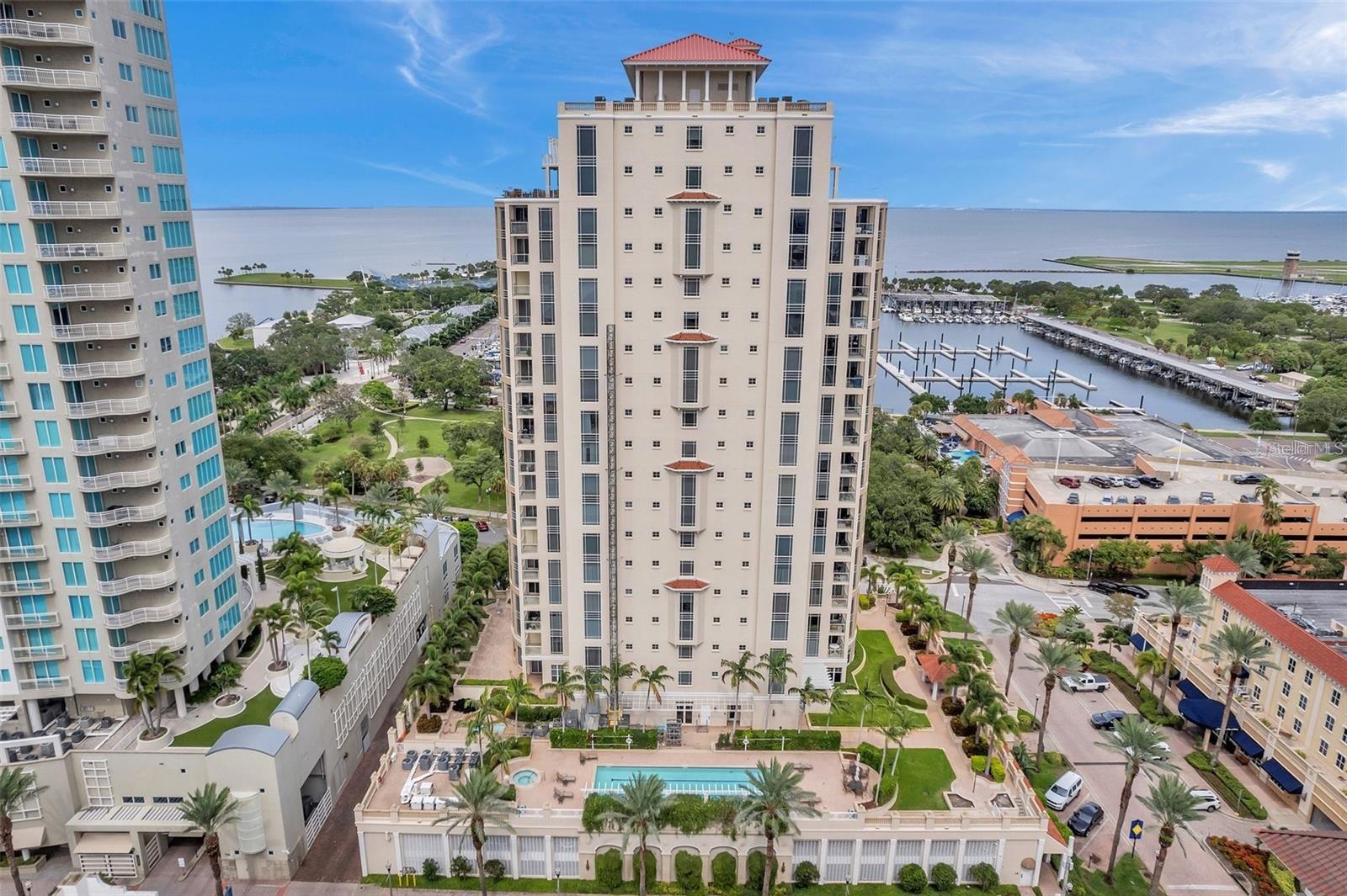 If you're looking to live downtown with unobstructed East water views in a premium location and top quality building, this is your dream home! Discover the luxurious JMC Waterfront Florencia residence in downtown St. Pete, offering nearly 3,000 total sq/ft of remodeled waterfront living space. This exquisite condo features 3 bedrooms, 3 bathrooms, PLUS an office/media room, a gorgeous open kitchen, wet bar, and spacious laundry room.

On the 10th floor, enjoy panoramic water views, high-end finishes, and convenient access with three elevators. The use of premium materials like marble, granite, and wood floors enhances the elegance, while top-of-the-line kitchen appliances elevate the space. Two expansive balconies offer endless views and seamless indoor-outdoor living.

From the moment you enter the 24-hour guarded lobby, you'll experience the ultimate in comfort and security. This building offers an array of amenities, including a heated pool and spa, fitness room, social space with a pool table, and more. The condo comes with 2 secured parking spaces and additional storage. Additional benefits include 24-hour concierge and security, on-site management, and a resort-style pool and spa area.

The location offers a vibrant lifestyle just steps from dining, entertainment, marinas, the new Pier, museums, galleries, waterfront parks, and shopping. Expansive views of Vinoy Basin, the Pier, the airport, and the Dali Museum create a truly stunning backdrop for everyday life. More pictures coming soon!
