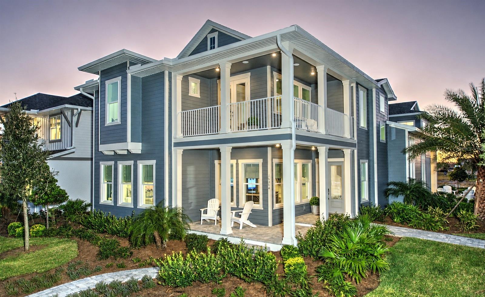 Rarely does the opportunity arise to own a professionally decorated model home in the heart of Lake Nona. This exceptional Fiji Coastal offers the unique advantage of a builder leaseback, allowing you to purchase today while the builder continues to showcase and maintain the home throughout the lease term. Offering over 4,000 living square feet, this luxury residence blends sophisticated design with everyday livability. The open-concept floor plan features an expansive great room with 14' ceilings, a gourmet kitchen with premium appliances, hidden walk-in pantry, oversized island, and seamless access to the covered lanai, creating an effortless indoor-outdoor lifestyle. The private first-floor owner's suite is a peaceful retreat with dual walk-in closets and a spa-inspired bath, while upstairs offers spacious secondary bedrooms and a large game room. Above the garage, a private one-bedroom, one-bath apartment with its own full kitchen and laundry provides incredible flexibility for guests, multigenerational living, or future rental income. Professionally curated by an interior design team, every finish, fixture, and detail has been carefully selected, allowing you to own a home that showcases the latest in luxury design without making a single design decision. Located in the award-winning Laureate Park at Lake Nona, you'll enjoy resort-style amenities, miles of trails, parks, fitness center, aquatic center, and a vibrant community lifestyle just minutes from Medical City, Orlando International Airport, exceptional dining, and entertainment. Model homes of this caliber are seldom available for purchase. Secure one of Laureate Park's showcase residences today, enjoy the benefits of the builder leaseback, and look forward to moving into a home that has been meticulously maintained and beautifully designed from day one.