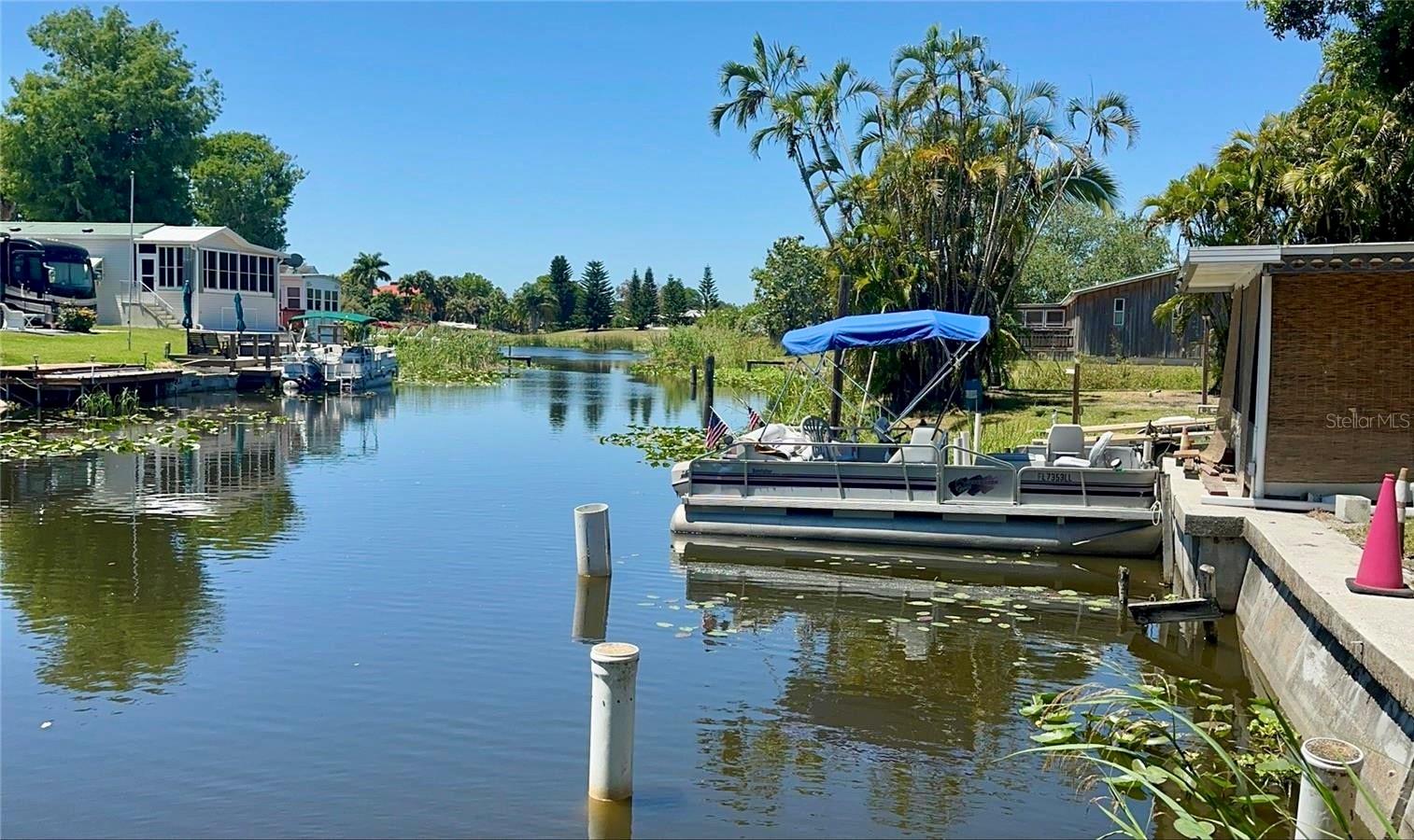 INVESTMENT OPPORTUNITY... IMMEDIATE CASH FLOW... MULTI-UNIT. TWO picturesque WATERFRONT canal PARCELS, granting access to Lake Okeechobee. Parcel 3112 boasts 75' of Waterfront, TWO robust concrete block structures, one encompassing a single-family home (1,200 sqft heated) ingeniously transformed into a PROFITABLE DUPLEX, 1Br/1Bath apt with kitchen & a Studio with separate kitchen and bathroom. Adjacent stands the SECOND building (1,100 sqft heated), housing a lucrative TRIPLEX featuring three Studio units. All FIVE units are furnished and equipped with essential appliances ideal for short or long-term rentals. Additionally, the property includes four 4'w x 3'd storage lockers, a 9'x 16' Laundry/utility room, and single car port with 5'x 7'storage. PARCEL 3122 presents an open oasis of leisure with over 200' WATERFRONT and space suitable for a double-wide mobile home. This parcel also features a screened 10'x 14' Florida room with convenient appliances for cleaning and cooking the day's fresh catch. A private boat ramp beckons alongside a wooden boat dock ensuring a seamless blend of comfort and functionality. New owners can purchase with current renters or start empty. Owner PAID Utility Authority for conversion from septic to city sewage ($14k Buyer Savings). A MUST SEE. Don't miss this fantastic opportunity to own a tranquil and welcoming waterfront INVESTMENT PROPERTY with spectacular views, wildlife, and a front seat to Florida living.
