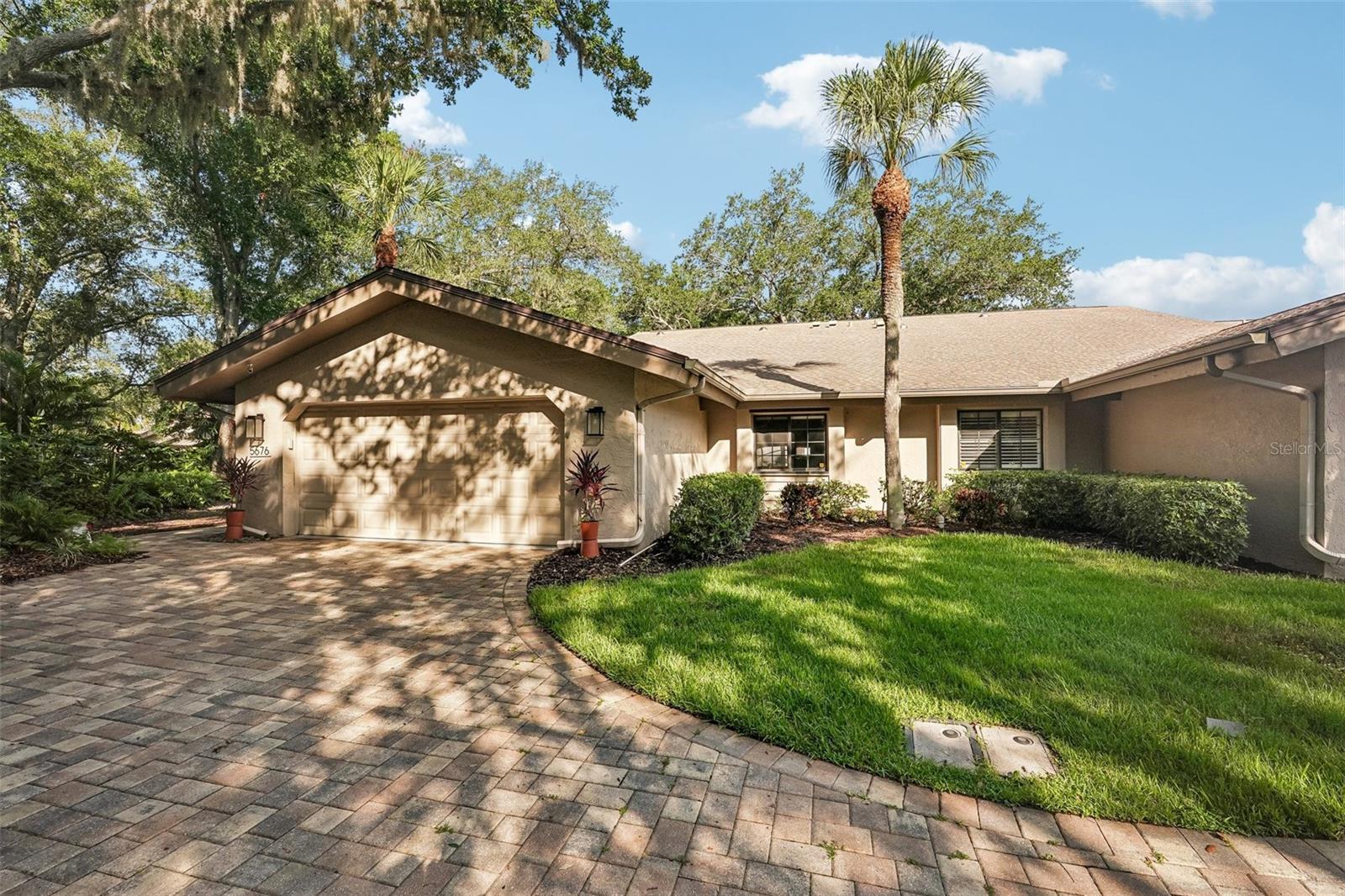 You are absolutely going to love this elegantly updated villa in the highly sought-after Pipers Waite neighborhood at The Meadows! From the moment you step through your private courtyard, the home welcomes you with spectacular volume ceilings, an abundance of natural light, and gorgeous new flooring throughout—including premium vinyl plank that leads into a custom dream kitchen sporting a newer stove and double oven, and Corian Countertops. You will have total peace of mind knowing the home has been meticulously maintained, featuring a complete re-plumb in 2025, a new water heater, an updated primary shower, and handy generator hookups. But the real showstopper is the incredible outdoor setting; the ultra-private Florida room offers a front-row seat to peaceful pond views and a fantastic daily parade of local wildlife, from elegant spoonbills to the occasional alligator. Step outside, and you’re just a block away from a heated pool and spa, all nestled within a 1,650-acre park-like oasis packed with fitness facilities, pickleball & tennis courts, and miles of gorgeous walking and biking trails. It truly offers the ultimate resort lifestyle, managing to feel completely serene and tucked away while remaining just minutes from world-class shopping at the UTC Mall, fabulous dining, and the vibrant heart of downtown Sarasota.