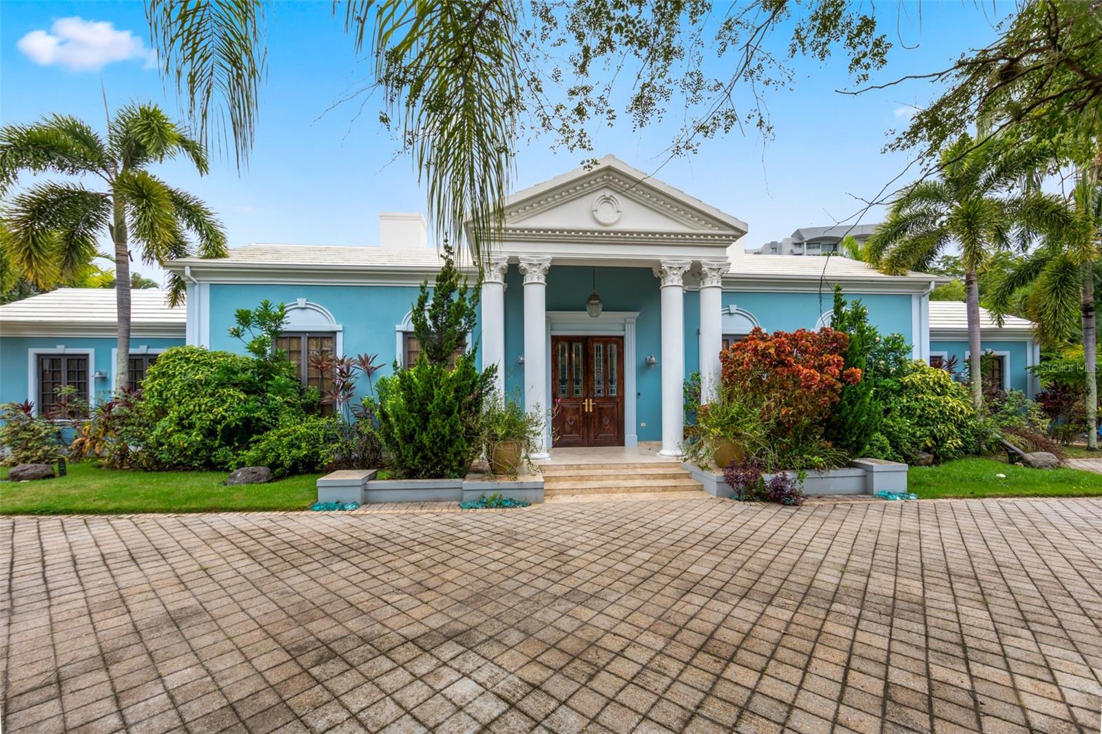 Beautifully positioned on a 1-acre homesite within Urb. San Patricio, this exceptional single-story residence offers 7,816 sq ft of thoughtfully designed interior space and expansive outdoor areas ideal for refined living and entertaining. The property features a spacious grand room with high ceilings, multiple flex spaces, a large primary suite with walk-in closets, and a well-appointed kitchen that connects seamlessly to the home’s social areas.

A total of 9 bedrooms and 10 bathrooms provide ample space for multi-generational living, guests, or dedicated work and recreation rooms. The exterior offers mature landscaping, covered terraces, a resort-style pool area, and generous driveway and garage capacity. Additional amenities include solar energy components, Tesla batteries, full backup generator, cistern, mini-split units and central AC handlers, smart-home features, alarm system, and a dedicated network hub.

This residence was sold as a Pocket Listing. Contact listing broker for information on similar upcoming opportunities in San Patricio and nearby luxury communities.