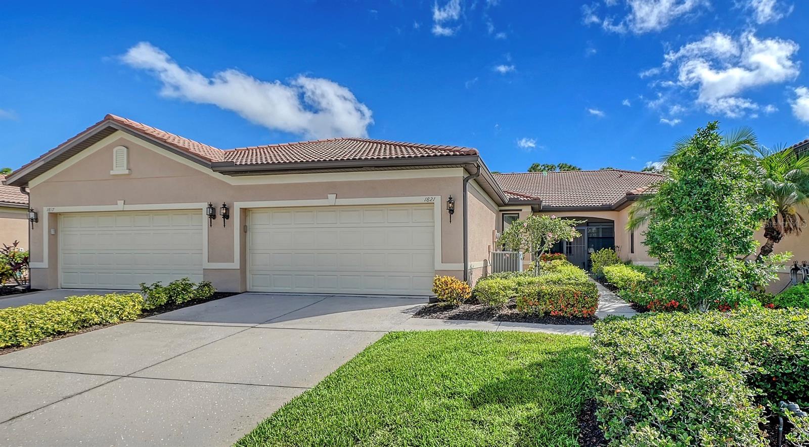 Enjoy maintenance-free, resort-style living in this beautifully updated 2-bedroom, 2-bath Palermo garden villa with a den and 2-car garage, located in the premier 55+ gated community of Venetian Falls. Tucked away on a quiet street, this home features an open-concept floor plan with ceramic tile flooring throughout the main living areas and newly installed carpet in the bedrooms and den. Providing comfort and peace of mind, the home includes impact-resistant windows, plus additional storm protection with accordion shutters on the lanai and clear panel shutters for windows. The living room is enhanced with a surround sound system, creating the perfect setting for relaxing to music or taking in a movie. The updated kitchen showcases newly installed quartz countertops and breakfast bar, along with recently installed stainless-steel refrigerator, range, and microwave. The spacious primary suite offers tranquil preserve views, an oversized walk-in closet, and an en-suite bath with dual sinks, a large walk-in shower, and a transom window that fills the space with natural light. French doors lead to a versatile den with front-facing windows, ideal for a home office, hobby room, or additional guest space. A guest bedroom, full bath with updated quartz countertop, and convenient laundry area complete the interior. Step outside to your screened and tiled lanai overlooking a peaceful preserve and private backyard setting — the perfect place to unwind and enjoy Florida living. Residents of Venetian Falls enjoy outstanding resort-style amenities, including a heated lap pool and spa, resistance-walking pool, state-of-the-art fitness center, billiards room, bocce courts, full-time activity director, on-site management, and more. The reasonable HOA fee includes lawn maintenance, internet, cable TV, exterior painting, and roof power washing. Conveniently located just minutes from shopping, dining, and the beautiful Gulf beaches, this exceptional home offers the best of comfort, convenience, and active lifestyle.