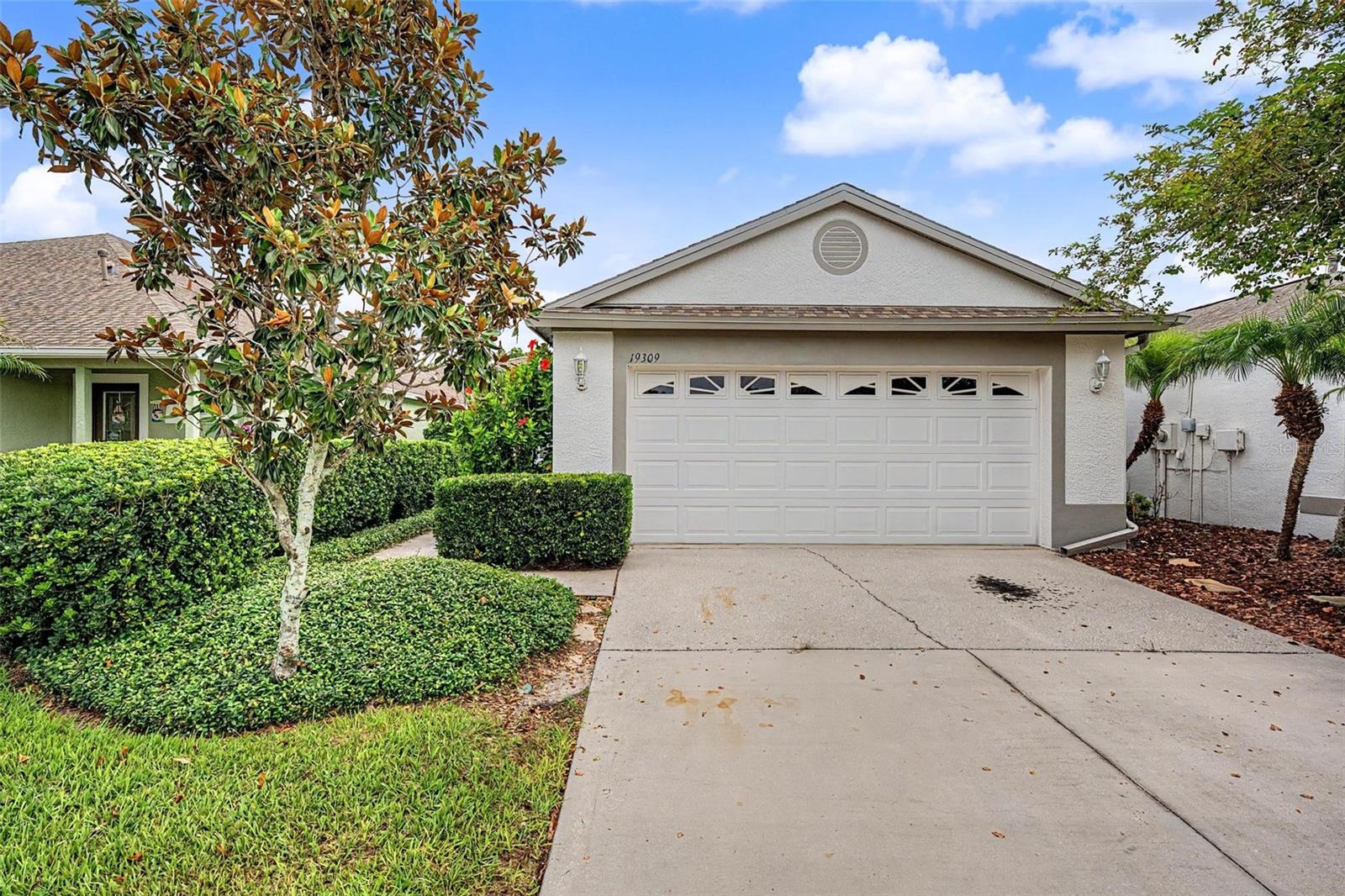 Welcome home to this inviting villa, nestled in the gated community of Oakstead. Step inside to find the adorable eat-in kitchen full of natural light, seamlessly connecting to the main living area for comfortable everyday living. Large sliding glass doors lead to your screened lanai, perfect for enjoying Florida evenings year-round, as well your private fenced backyard.
The desirable split-bedroom layout offers privacy for both residents and guests, featuring a generously sized secondary bedroom and full bathroom. A dedicated office with French doors provides an ideal work-from-home space, while the oversized laundry room adds convenience and additional storage.
Retreat to the spacious primary suite, complete with ample closet space and an en-suite bath featuring dual vanities, a relaxing soaking tub, and a separate walk-in shower.
Residents enjoy access to Oakstead impressive collection of amenities, including a clubhouse, resort-style saltwater pool, soccer fields, tennis and pickleball courts, playgrounds, and miles of scenic walking and biking trails. Ideally situated in the heart of Land O' Lakes, this home offers convenient access to shopping, dining, and the Veterans Expressway, making commuting throughout the Tampa Bay area a breeze.
Schedule your private tour today!
