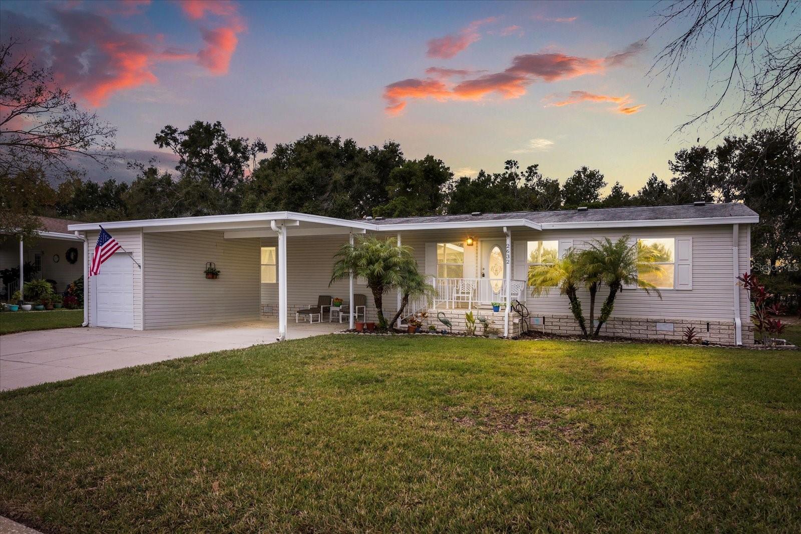 Stunning 3BR/2BA Triple-Wide with Versatile Bonus Room. $10,000 Credit at Closing for Buyer Upgrades. This bright and airy split-plan home features soaring ceilings and a flexible layout designed for modern living. The spacious bonus room—currently a formal dining room seating 10—can easily serve as a sun-drenched family room overlooking the private backyard. The large kitchen and casual dining area offer additional space for hosting. Highlights include 1 Year American Home Shield Home Warranty. Home features an expansive primary ensuite &  double carport. Your Dream Home for this Next Chapter of Life Awaits You!
Located in a premier, guard-gated 55+ community, residents enjoy 4 pools, a woodshop, a full-service restaurant/bar, and reduced golf fees. The comprehensive HOA includes high-speed fiber optic internet, cable, lawn care, and trash.