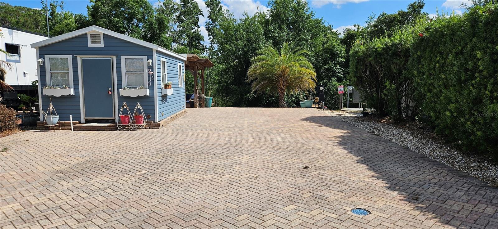 A rare Premium water view RV lot for sale or lease, which ever comes first. Rolling Ridge RV Resort is a 55+ gated community for the RV enthusiast. This 40x60 lot sits on a tranquil pond with a private shed/laundry and workshop. Fully paved with all hookups and 20/30/50 power. Besides the gated entrance, the community amenities include a heated pool, shuffleboard, tennis and pickleball courts, clubhouse with billiard room and abundant weekly activities. Low HOA dues include water and sewer. WiFi is free in the clubhouse. You can also rent your lot short term with restrictions as investment income. The lot is large enough for the biggest RV or a mobile home. Ideally located 1 mile South of the Highway 27 and Florida's Turnpike interchange, Rolling Ridge offers close proximity to Clermont and Minneola shopping, Lakeridge Winery and all the theme parks Central Florida is famous for.