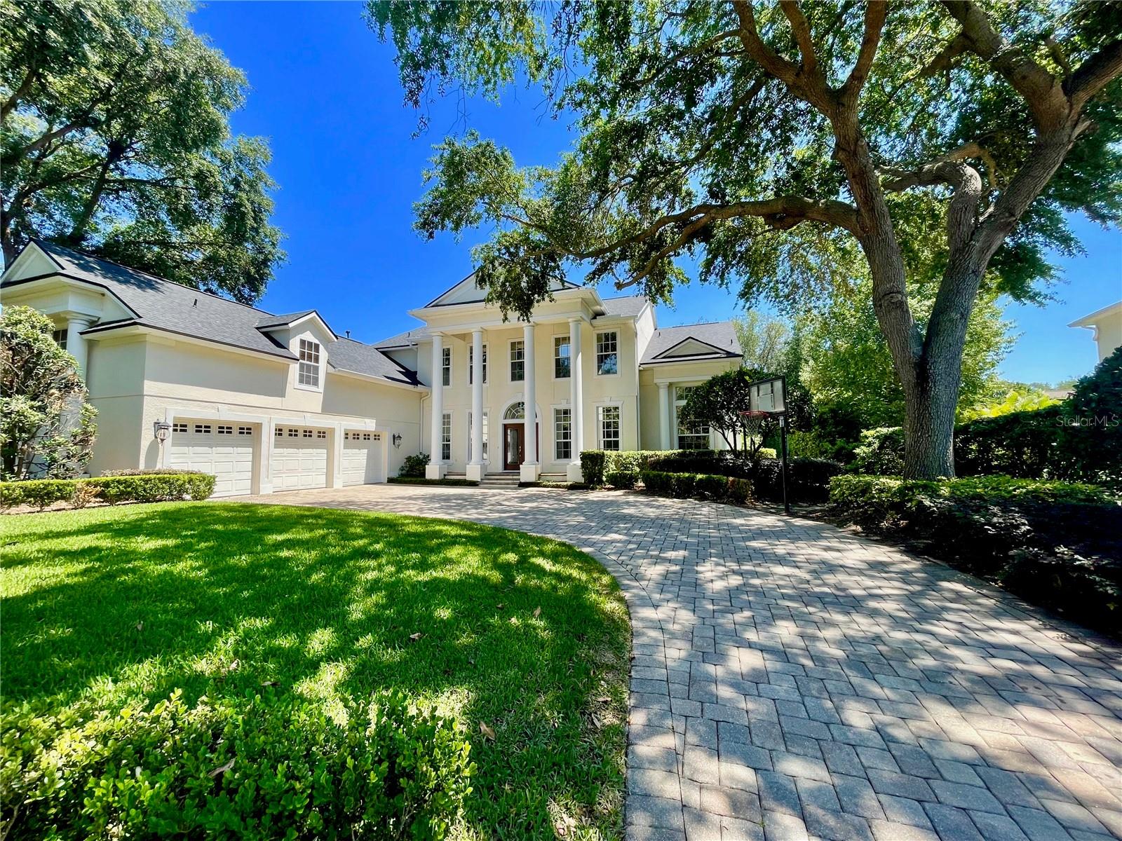 Keene's Pointe gated/24-hour attended home featuring 4 bedrooms, 4 full/2 half baths, formal living and dining rooms, loft/office, and bonus/game room. This spacious home has low maintenance laminate flooring throughout. The primary suite is on the first floor with access to the lanai, walk-in closet with customized shelving and bath with tub, shower and two vanities. The kitchen and family room are centered in the home with multiple doors to the lanai. The family room has a two-story ceiling with gas fireplace and built-ins. Upstairs you will find a loft with built-in cabinetry that can also be a study, bonus/game room over the garage with full bath and three additional bedrooms (one is an en-suite and the other two share a hall bath). The back yard is spacious and has a large pool/spa with fencing, separate half pool bath, and covered lanai. There is also a three car garage large enough to house a golf cart. Shallow well for irrigation, built-in closet shelving, newer roof, AC units, gas water heater, and gutters are just some of the great features of this home. Discover all this community has to offer, including The Golden Bear Club, a private 18-hole golf course designed by Jack Nicklaus offering golf, tennis, swimming, dining and clubhouse. Located close to shopping, dining, expressways and top-rated public and private schools, this home is perfect as a primary home or vacation home. Call today for you private viewing.