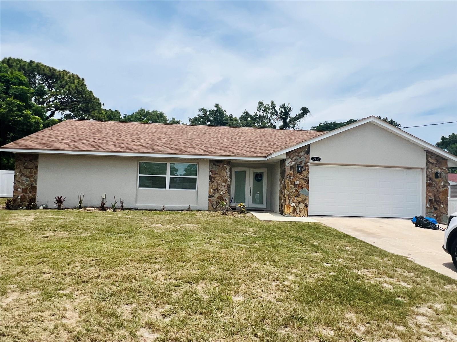 STOP SEARCHING THIS IS FOR YOU!!! NO HOA, NO FLOOD ZONE, NO CDD. FROM THE MOMENT YOU WALK IN YOU FEEL RIGHT AT HOME. WITH A LARGE OPEN FLOOR PLAN, LIVING SPACE IS LARGE AND OPENS UP TO THE UPDATED KITCHEN, GRANITE COUNTER TOPS, WITH PLENTY OF CABINETS, STAINLESS STEAL APPLIANCE, AND LARGE ISLAND, GREAT FOR ENTERTAINING FAMILY AND GUESTS. KITCHEN ALSO HAS A COFFEE/WINE BAR WITH MORE CABINETS AND A WOOD BURNING FIRE PLACE. LARGE KITCHEN ISLAND MAKES FOR A GREAT AREA TO HANG OUT AND ENTERTAIN NEXT TO A BEAUTIFUL FIRE. LOTS OF RECESSED LIGHTING TO MAKE IT LIGHT AND BRIGHT. THIS HOME HAS ALL YOU NEED, 4 BEDS, 2 UPDATED BATHS, HOME HAS BEEN COMPETELY UPDATED FROM NEWER ROOF, AC, WINDOWS, SEPTIC, WATER TANK, KITCHEN, BATHS, FLOORING. THIS UNIQUE PROPERTY ALLOWS FOR ALL THE SPACE YOU NEED ON THE INSIDE, WITH A BONUS ROOM UPSTAIRS THAT CAN BE AN INLAW OR GUEST SUITE, A GAME ROOM FOR THE FAMILY, CRAFT ROOM, EXERCISE ROOM, OFFICE, ENDLESS OPPORTUNITIES WITH THIS ROOM PLUS WITH IT'S OWN BALCONY TO OVER LOOK YOUR PRIVATE BACK YARD. THE OUTSIDE HAS ROOMS FOR ALL YOUR TOYS, NICE GARDEN, BUILD ANOTHER GARAGE OR POLE BARN,. BACK OF HOME HAS A NICE COVERED PATIO TO ENJOY YOUR MORNING COFFEE OR SIT AND RELAX IN THE PEACE AND QUIET. HOME HAS AN ABOVE GROUND POOL TO RELAX IN AND ALL THIS ON ALMOST 1/2 AN ACREA, FENCED YARD. THIS HOME IS CENTRALLY LOCATED TO SHOPS, RESTRAUNTS, BEACHES, AIRPORT, AND MORE.