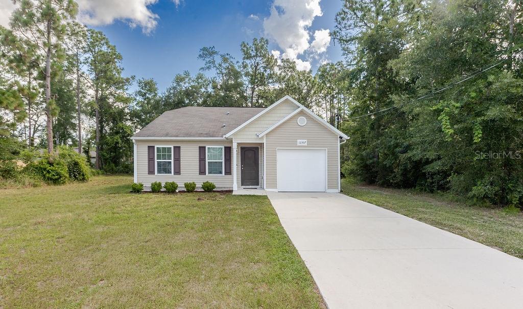 Welcome to this beautifully maintained 3-bedroom, 2-bathroom home in the desirable Royal Highlands community of Weeki Wachee! Built in 2018 and situated on a spacious 0.64-acre homesite with no HOA, this move-in-ready home offers the perfect blend of modern comfort, privacy, and everyday functionality. Step inside to an inviting open-concept layout featuring luxury vinyl plank flooring, a bright and spacious living area, a dedicated dining space, and a well-appointed kitchen with ample cabinetry for effortless everyday living and entertaining. The home comes complete with a refrigerator, range, over-the-range microwave, dishwasher, washer, and dryer, making your move even easier. Outside, enjoy the expansive backyard with plenty of room to add a pool, create a garden, store your recreational toys, or simply relax and enjoy Florida’s year-round sunshine. Conveniently located just minutes from US-19, shopping, dining, medical facilities, and the crystal-clear waters of Weeki Wachee Springs, this property offers easy access to everything you need while maintaining the privacy and freedom of a spacious homesite with no HOA restrictions. Don’t miss this opportunity to own a newer home with room to grow in one of Weeki Wachee’s most sought-after areas!