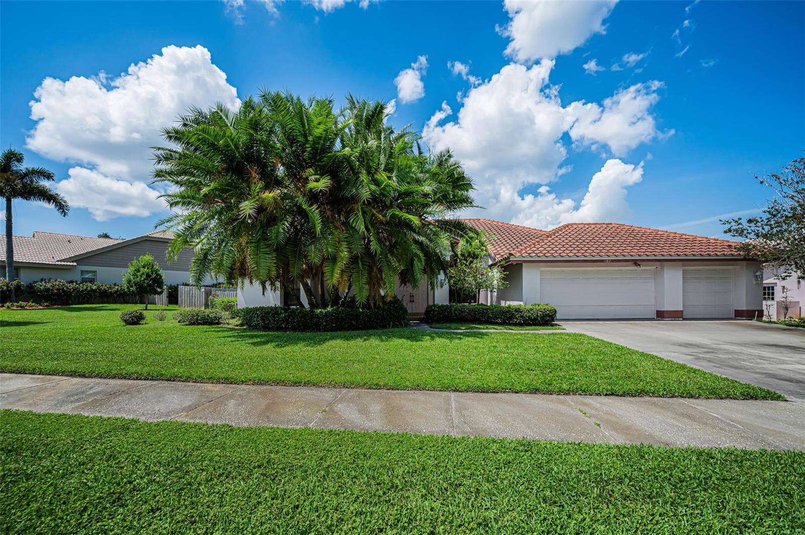 Safety Harbor! Calling all Investors. This is the home you have been waiting for. Located in the Premier community of Weatherstone, built in 1987 with four bedrooms, three full baths, 2,933sf. of living area, an in-ground pool and spa plus a three car garage all situated on an over sized lot of 102 X 130ft. Exceptional three way split floor plan, high ceilings through out, fireplace, and a pool bath. The home needs a total renovation inside and out. Public records reflects a new tile roof going on in 2015 and a new A/C system in 2021. This is a neighborhood of 1M dollar homes and high and dry with no flood insurance required plus located outside all evacuation zones. If you are looking for a project you came to the right home. All block construction waiting for a complete transformation.