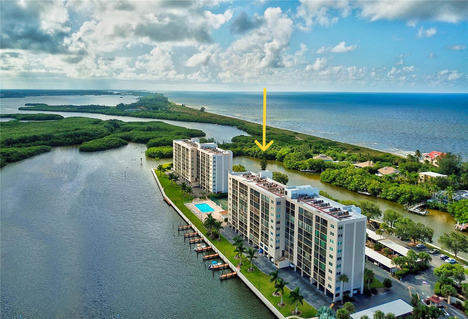 SIESTA KEY. WATERFRONT. INVITING & CLEAN. *** Stunning views! This 2B/2B condominium overlooking the bay has been beautifully renovated and is ready to move into! Turnkey furnished featuring an open kitchen with granite countertops, stainless appliances, and solid-wood cabinets providing plenty of room for entertaining guests or simply relaxing while you watch the spectacular views of the bay and nature preserve. There are tile floors throughout, recessed lighting, and solid wood interior doors. Both bathrooms were remodeled. *** Enjoy the amazing sunrise each morning as you sip your tea or coffee. The expansive lanai is perfectly suited to watch the dolphin and manatee, the boaters and kayakers paddle by, or to merely take in the remarkable marine and wildlife. There is a washer/dryer in the unit and the separate storage area on the lower level provides space to store your beach chairs, fishing and golf gear, or extra items.
*** ISLAND LIFESTYLE *** THE POINTE is a PET-FRIENDLY gated community offering the best of both worlds: activity and exercise, plus peace and tranquility. Surrounded by water on three sides and encompassing 5+ acres of prime waterfront real estate. Features include Boat docks w/electricity and water. Outdoor, fresh-air walkways to each unit. Heated outdoor lap pool. Spa. Sauna. Kayak/canoe/SUP launches. Tennis and pickleball courts. Dog walk. Open-air gazebo with BBQ grills. Club house. Separate entertainment/party rooms. A fitness center in each building. Butterfly garden, and more. ADVANTAGEOUSLY LOCATED: Fine and casual dining, Turtle Beach, a campground on the beach, shopping, coffee shops, nightlife, entertainment, Siesta Key Beach, a full-service marina, public transportation and much more - all on Siesta Key.  A rare find and unique chance to own a piece of paradise!