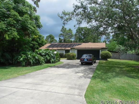 GREAT OPPORTUNITY TO LIVE IN BEAUTIFUL-WUIET NEIGHBORHOOD IN A COUNTRY SETTING, YET CLOSE TO EVERYTHING YOU USE: RESTAURANTS, SHOPPING, GAS STATIONS, I95, BEACHES, RIVER.  WELL CARED FOR HOUSE IS READY TO NEW OWNER TO MAKE IT YOUR HOME.  4/3/2 CAR GARAGE BLOCK HOME WITH A SALTWATER SCREENED POOL W/SOLAR PANELS.  ON 1.99A.  PROPERTY IS FENCED AND HAS TWO OUT-BUILDINGS W/POWER PERFECT FOR YARD EQUIPMENT OR THE HANDY MAN OR CRAFTY WOMAN. MASTER HAS LG WALK-IN CLOSET AND GARDEN TUB. FORMAL DINING ROOM IN MAIN ENTRY AREA, AND 18X18 FAMILY ROOM/GREAT ROOM OFF KITCHEN AFFORDS PLENTY OF ENTERTAINING SPACE, AND HAS SLIDERS TO POOL, AS DOES THE LIVING ROOM AND MASTER.THERE IS AN IN-LAW SUITE OR ROOM FOR YOUR OLDER CHILD WITH SEPARATE ENTANCE AND 10X10 WOOD DECK.  FRESHLY PAINTED, NEW CARPET IN LR, DR, REMAINDER OF HOUSE IS TILED. INSIDE LAUNDRY. CEILING FANS THROUGHOUT. HURRICANE SHUTTERS.  2-CAR GARAGE HAS STORAGE. BEING SOLD AS-IS. YOU MAY WANT TO UPDATE.  ALL MEASUREMENTS APPROXIMATE